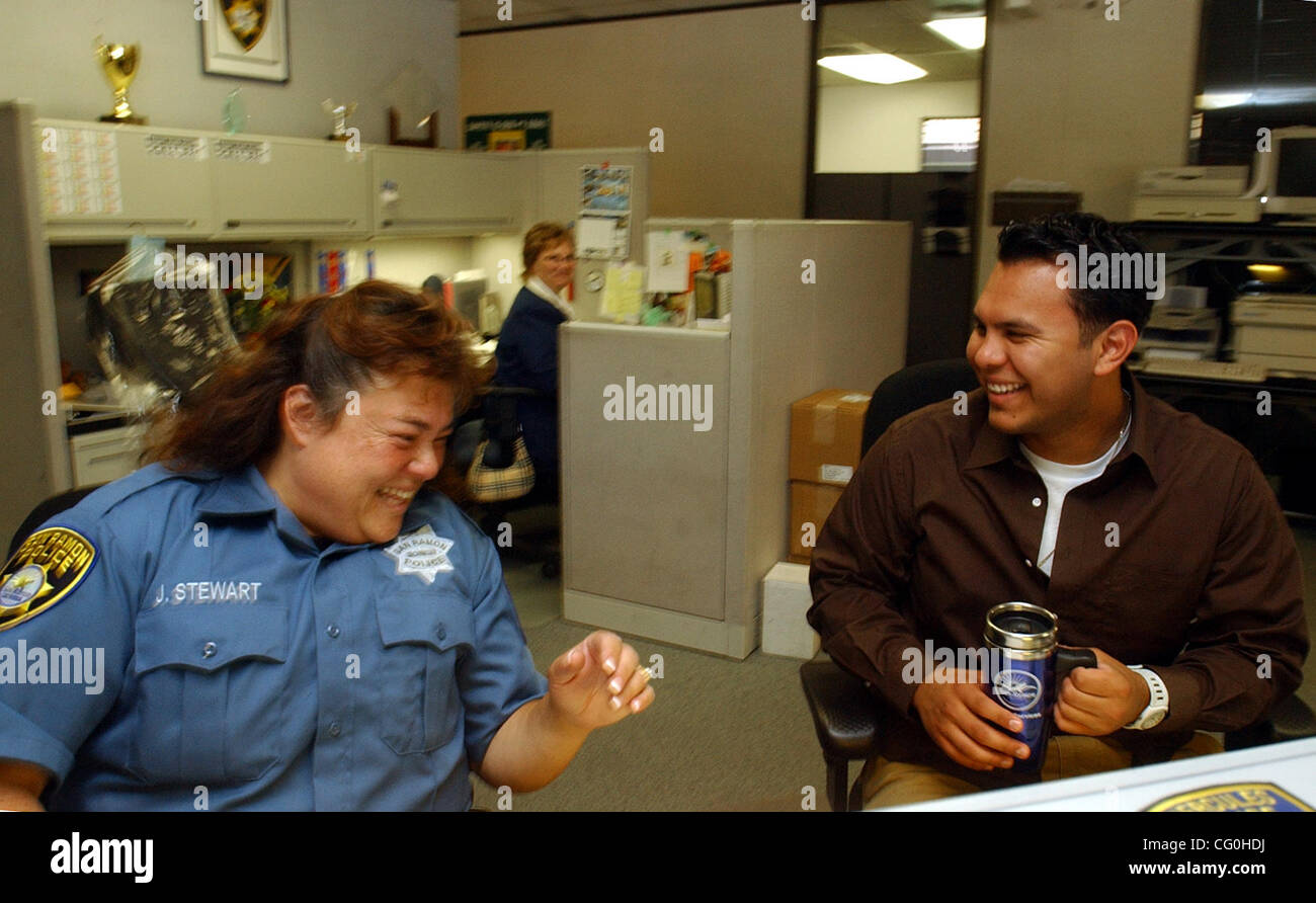 The latest recipient of the Sentinel of Freedom is Manny Del Rio who visits with Jennifer Stewart, Police Services Technician at the San Ramon Police Department Thursday, June 28, 2007 in San Ramon, Calif. Del Rio will receive job training from the police department before working at the Dougherty V Stock Photo
