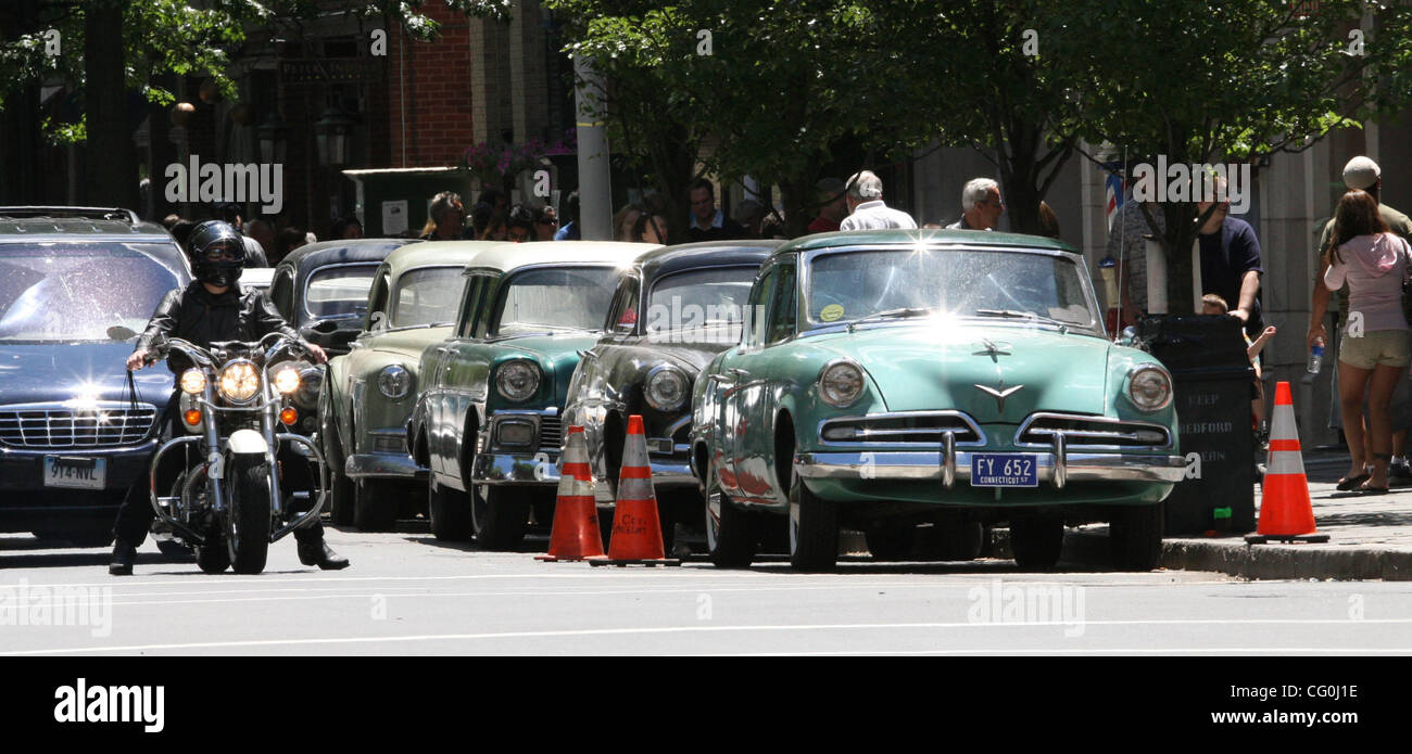 Headline: Indiana Jones FIlms in New Haven, CT Caption: Chapel St. in New Haven, CT has been transformed  back to 1957  with vintage cars, air raid shelter signs and recreations of store signs and window displays of the time for the filming of the fourth Indiana Jones movie. When filming is not taki Stock Photo