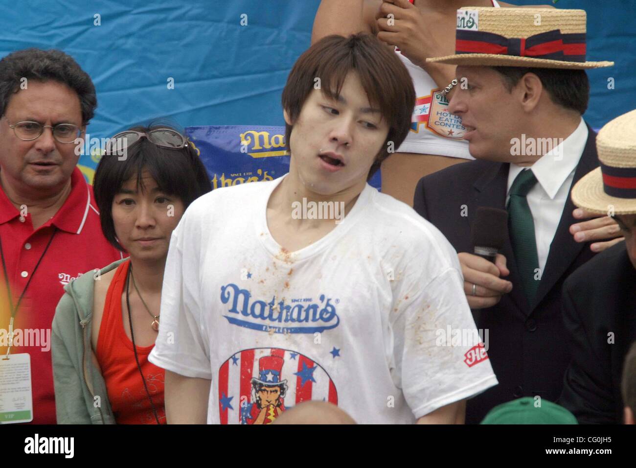 July 4, 2007 - New York, New York, U.S. - Nathan's Hot Dog Eating Contest held in Coney Island Brooklyn .New York . Joey Chestnut is the new Hot Dog Champ eating 66 hot dogs and the former champ Takeru Kobayashi with 63 hot dogs. Takeru Kobayashi.              7 - 4 - 07     .  -   2007   .K53718BCO Stock Photo