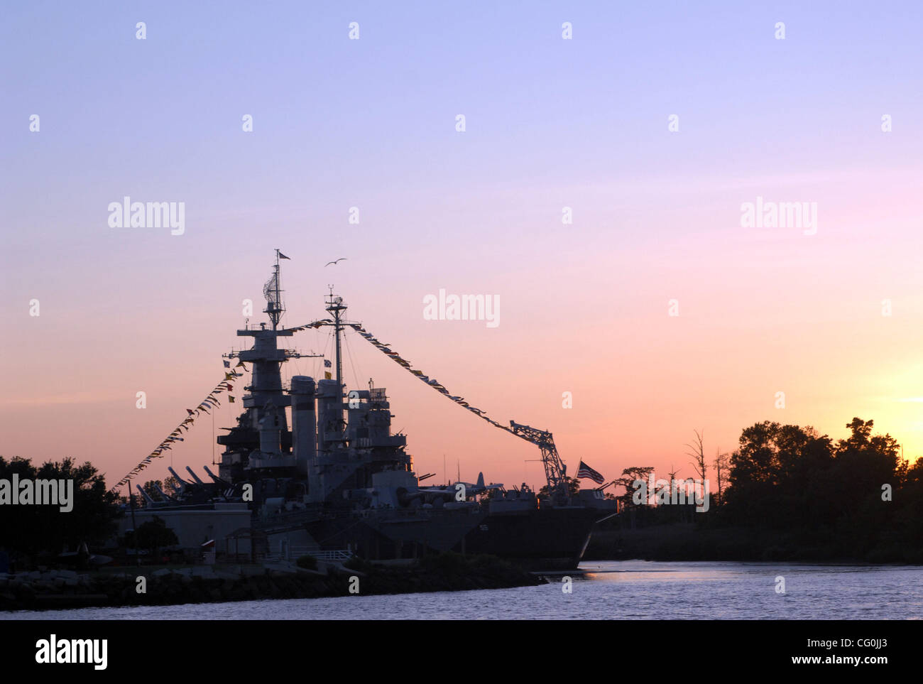 Jul. 4, 2007 Wilmington, NC; USA, The sunsets over top the USS North ...