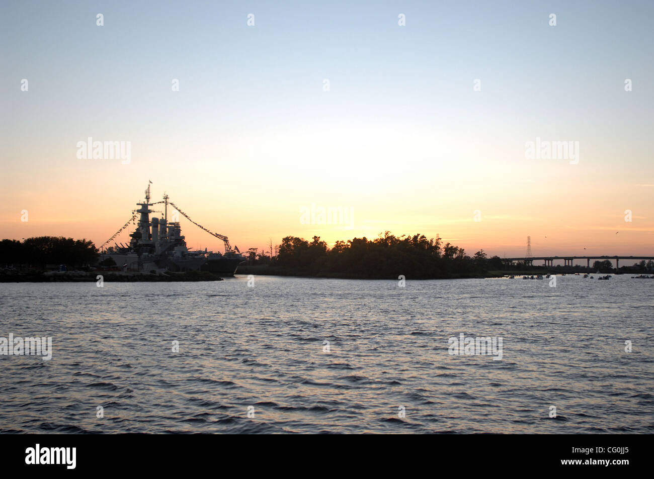 Jul. 4, 2007 Wilmington, NC; USA, The sunsets over top the USS North ...