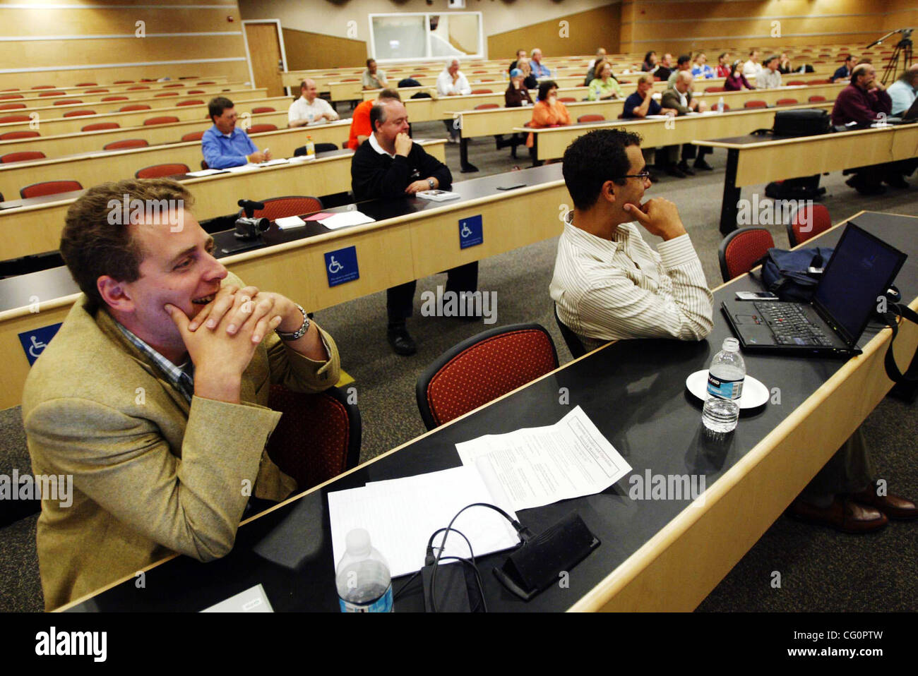 Ben Alamar of Menolo College (left) listens to a panel discuss baseball statistics during a symposium at Cal State University East Bay on Wednesday, July 11, 2007, in Hayward, Calif. (Jane Tyska/The Daily Review) Stock Photo