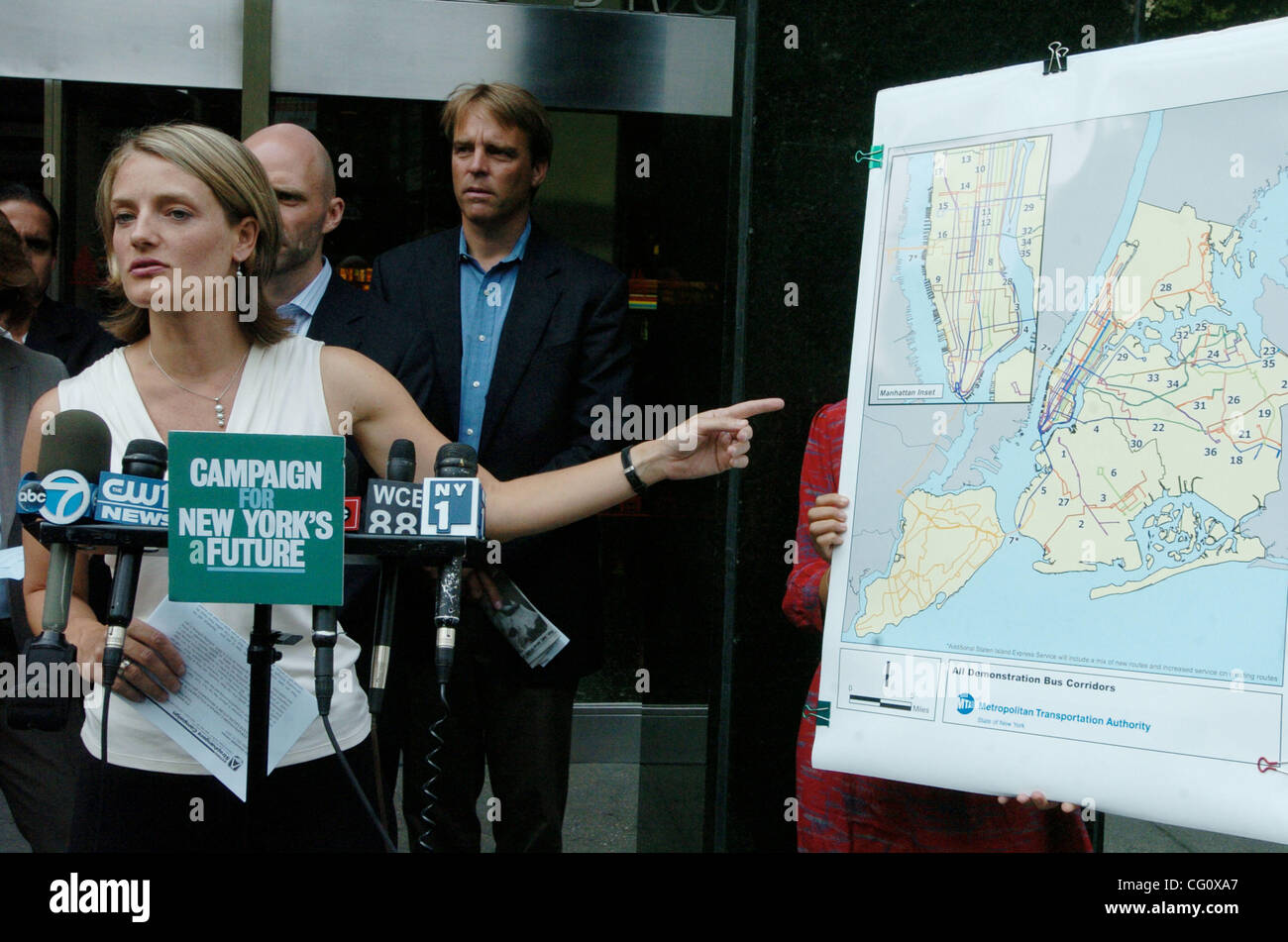 Neysa Pranger of the Straphangers Campaign speaks as leading members of