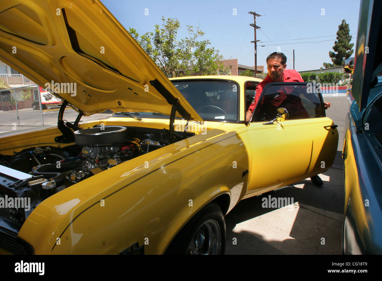 July 30, 2007 Carlsbad, CA, GEORGE GONZALEZ worked on his 1973 Chevy Nova,  getting it ready for the ROD RUN 18 and car show in Vista Sunday August  5th. Mandatory Credit: Photo