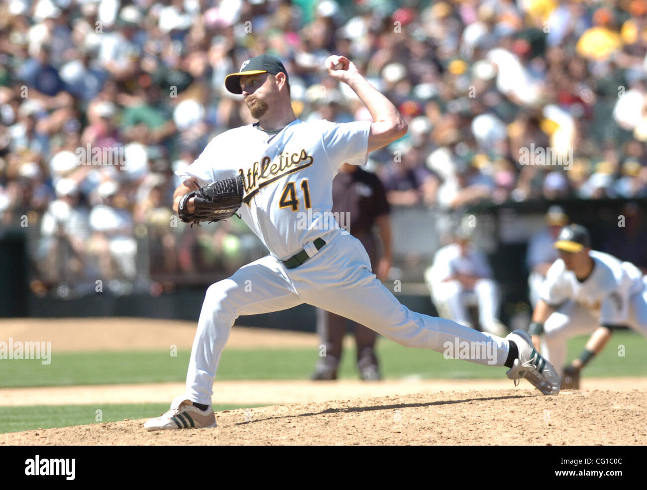 A's reliever Alan Embree (#41) throws against the California Angels in ...