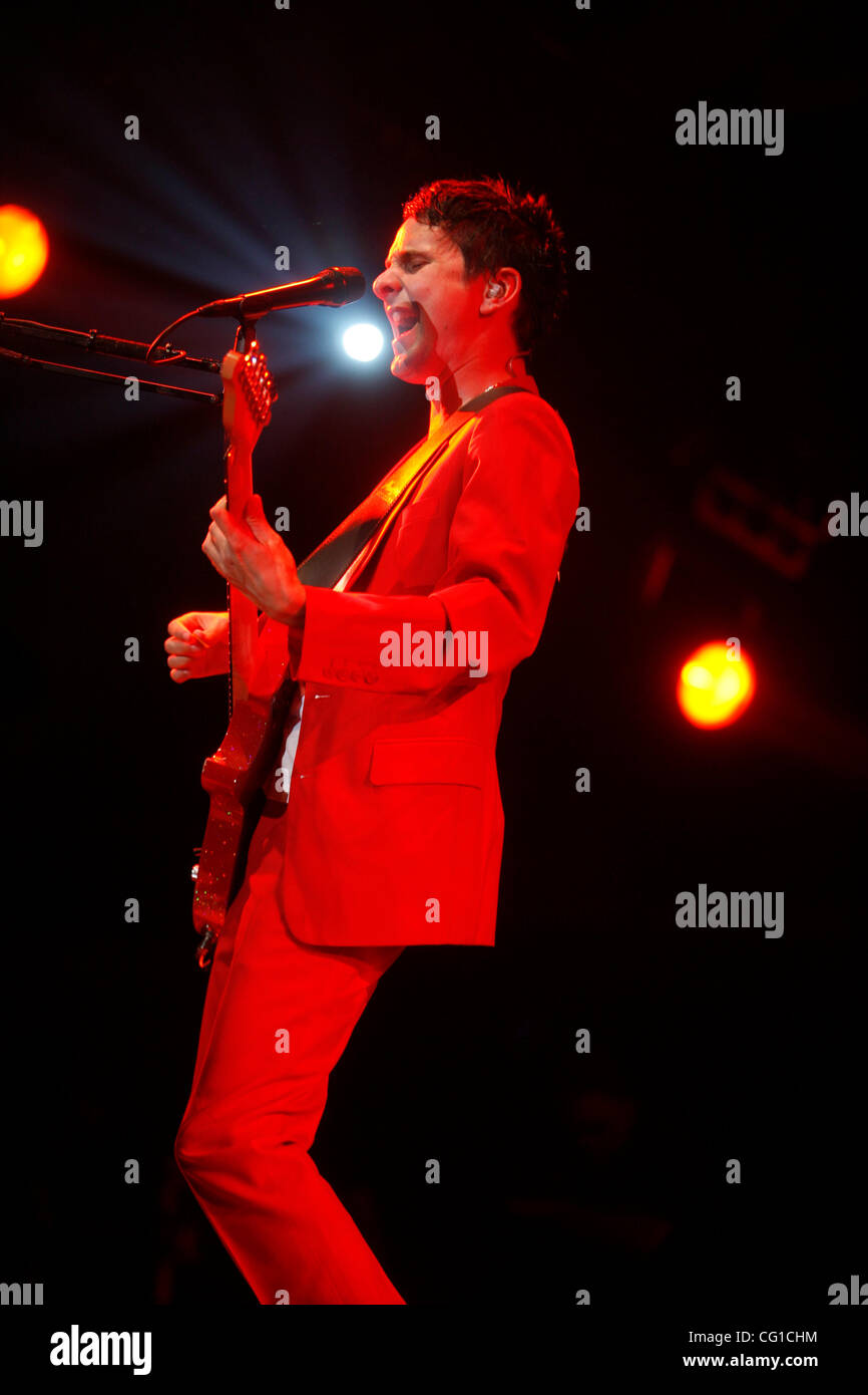 Muse Performing At Madison Square Garden On August 6 2007 Matthew Bellamy On Vocals In Red Suit Christopher Wolstenholme On Bass Dominic Howard On Drums Stock Photo Alamy