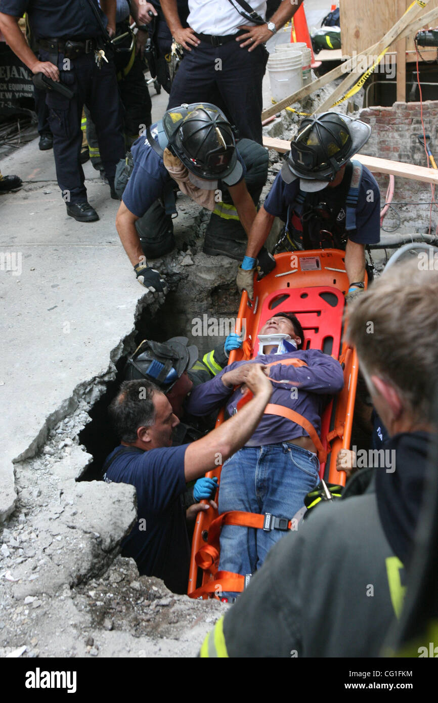 Firefighters rescue 2 construction workers on 148 West 36th. St. today ...