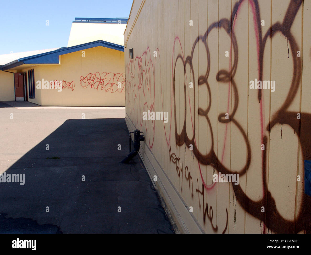 Two brothers have been arrested in connection with the graffiti that mars almost every wall of Lake Elementary on Wednesday August 22, 2007, in San Pablo, Calif.  Charges of felony vandalism are being sought against the vandals.    (Gregory Urquiaga/Contra Costa Times/ZUMA Press) Stock Photo