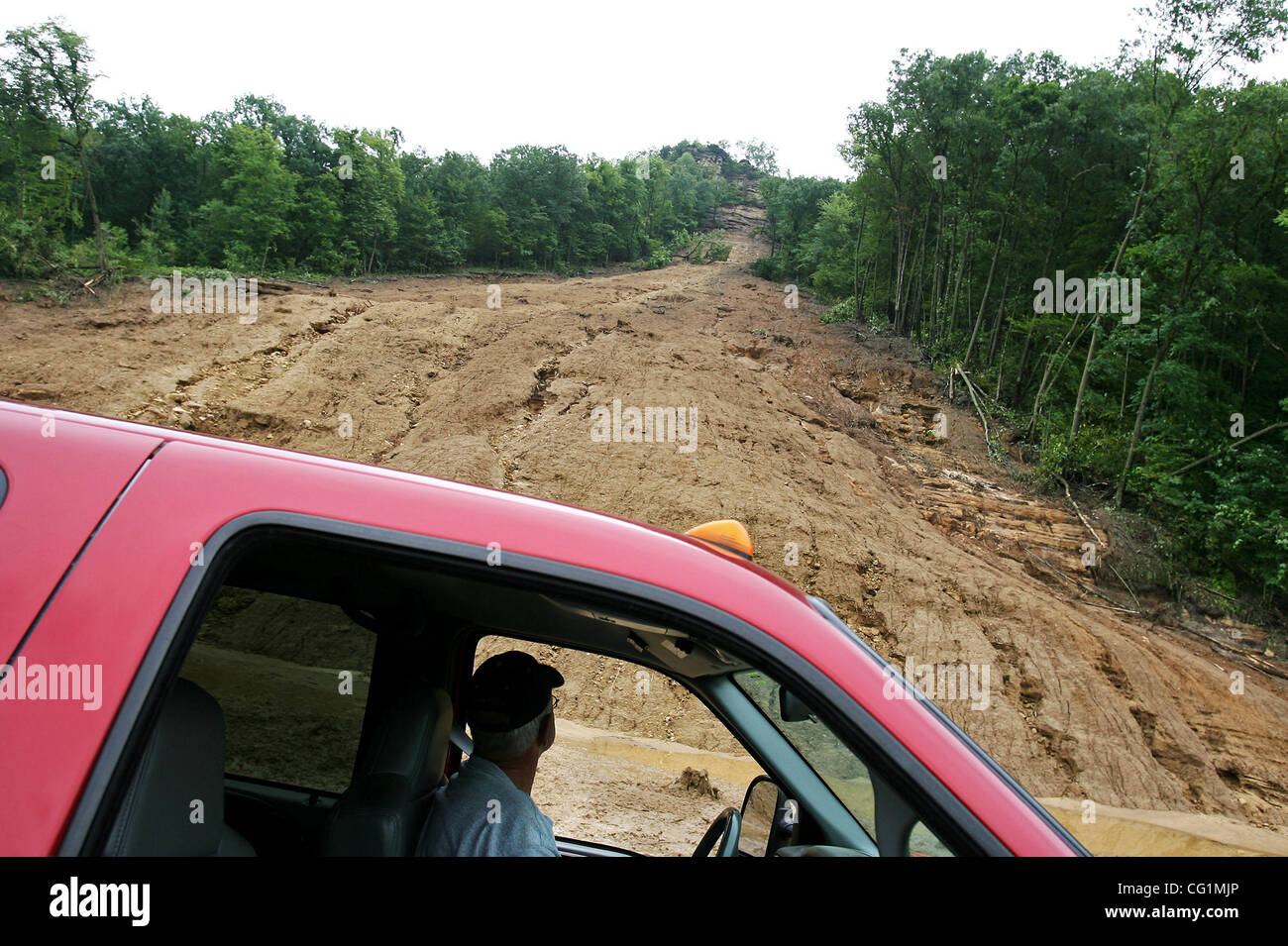 August 21st, 2007 Hokah, MN, USA Larry Kreibich looks at the swath