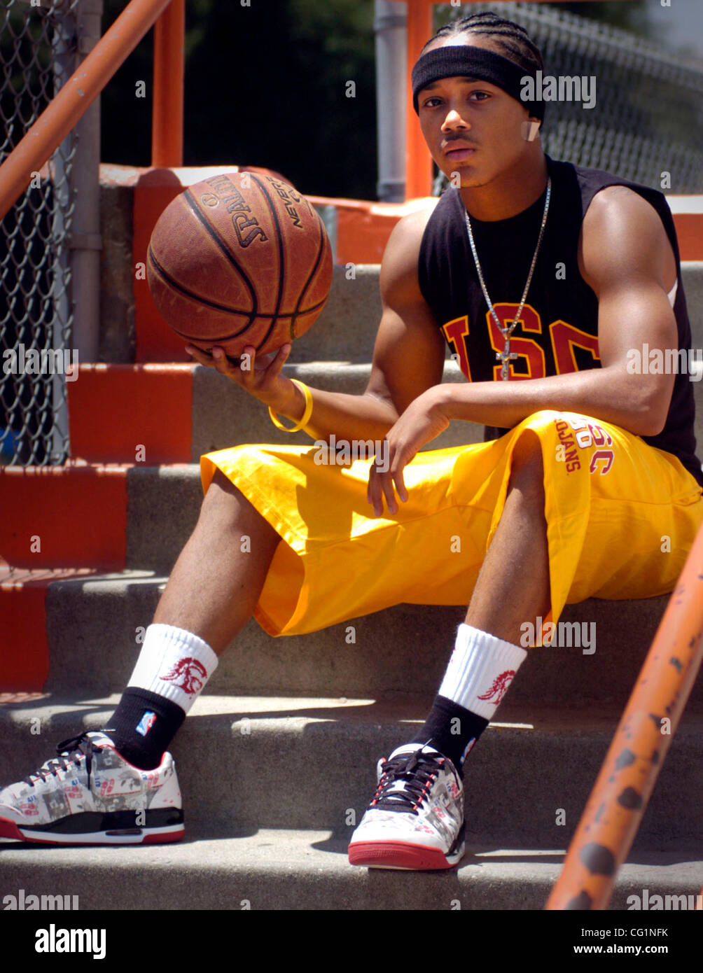 Romeo Miller, formerly known as rap star Lil Romeo, sits on the steps at  Beverly Hills high school in Beverly Hills Ca. Friday afternoon June 23,  2007. Miller, who will be a