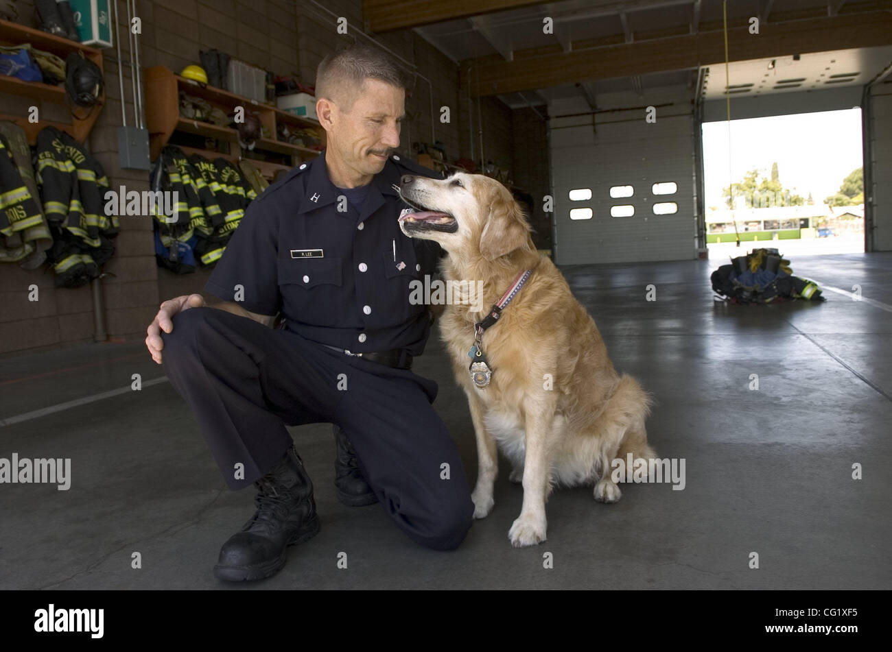 Cpt. Rick Lee of the Sacramento Fire Department Station 56 says he'll retire Ana (cq on 1 n) later this year. She has been working since 1997 and is the first California urban search and rescue dog. Ana went to the World Trade Center aftermath of Sept. 11 as well as Hurricane Katrina. The Sacramento Stock Photo