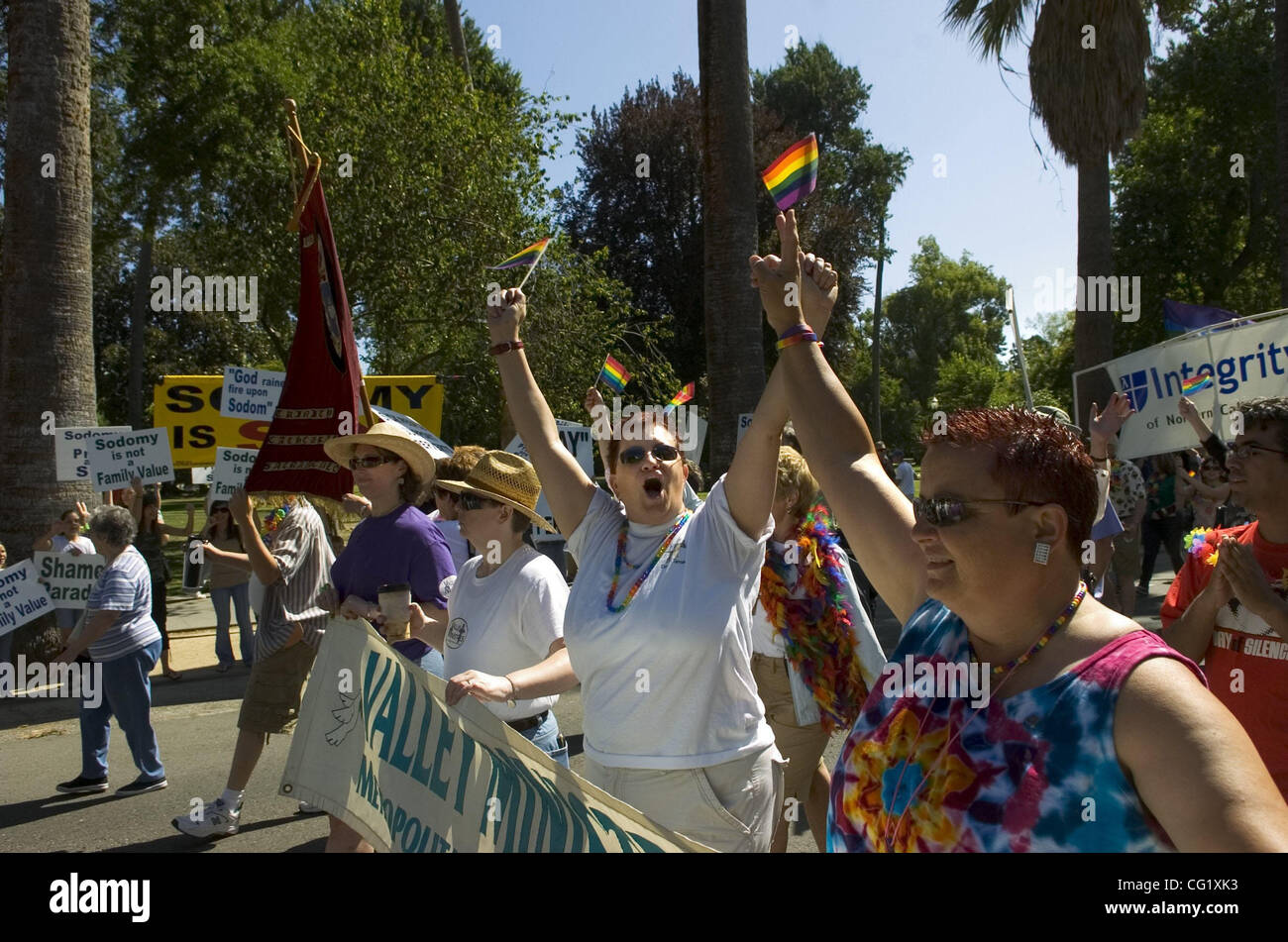 Celebrating 20 years of the gay pride movement, marchers had a some opposition along the sidelines during their walk from Capitol Park to Southside Park Saturday. The Sacramento Bee/  Anne Chadwick Williams/  June 16, 2007 Stock Photo