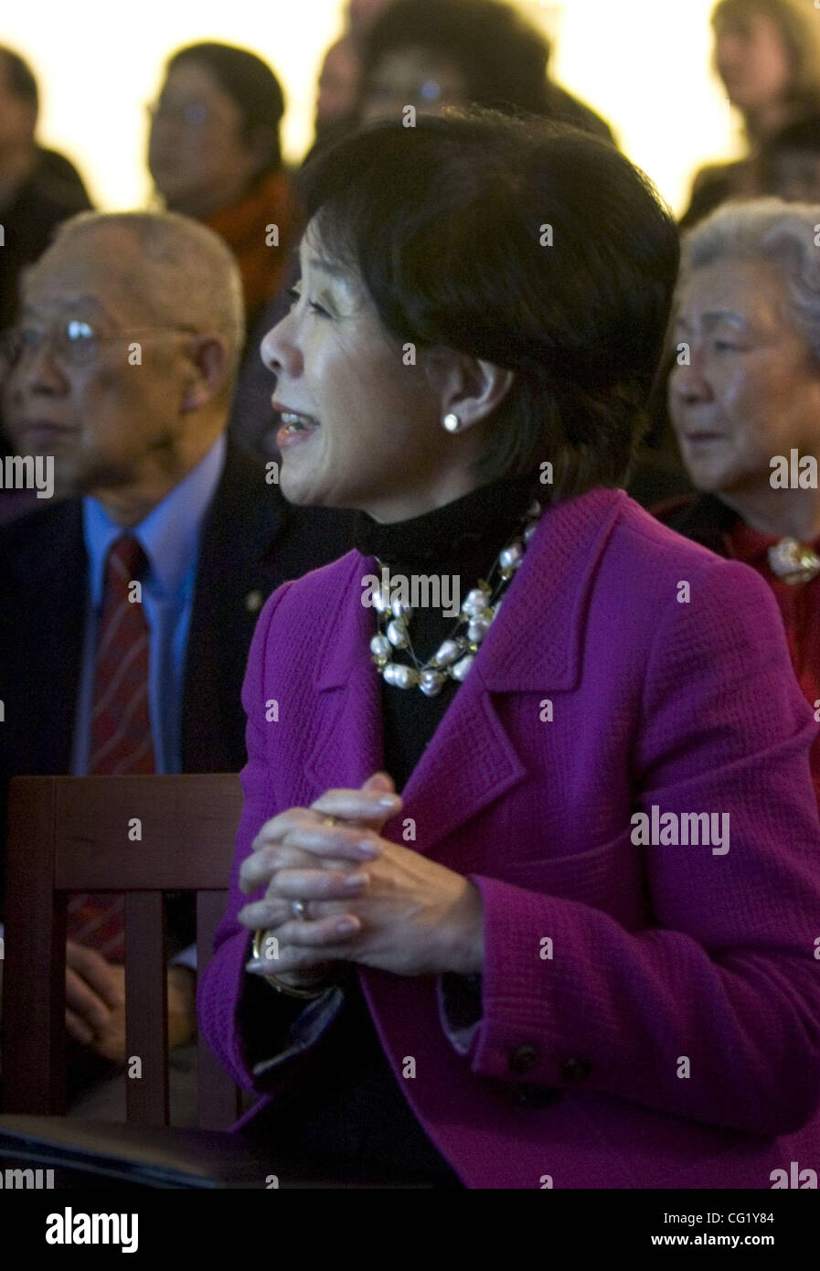 Doris Matsui watches a slideshow honoring her late husband, Robert