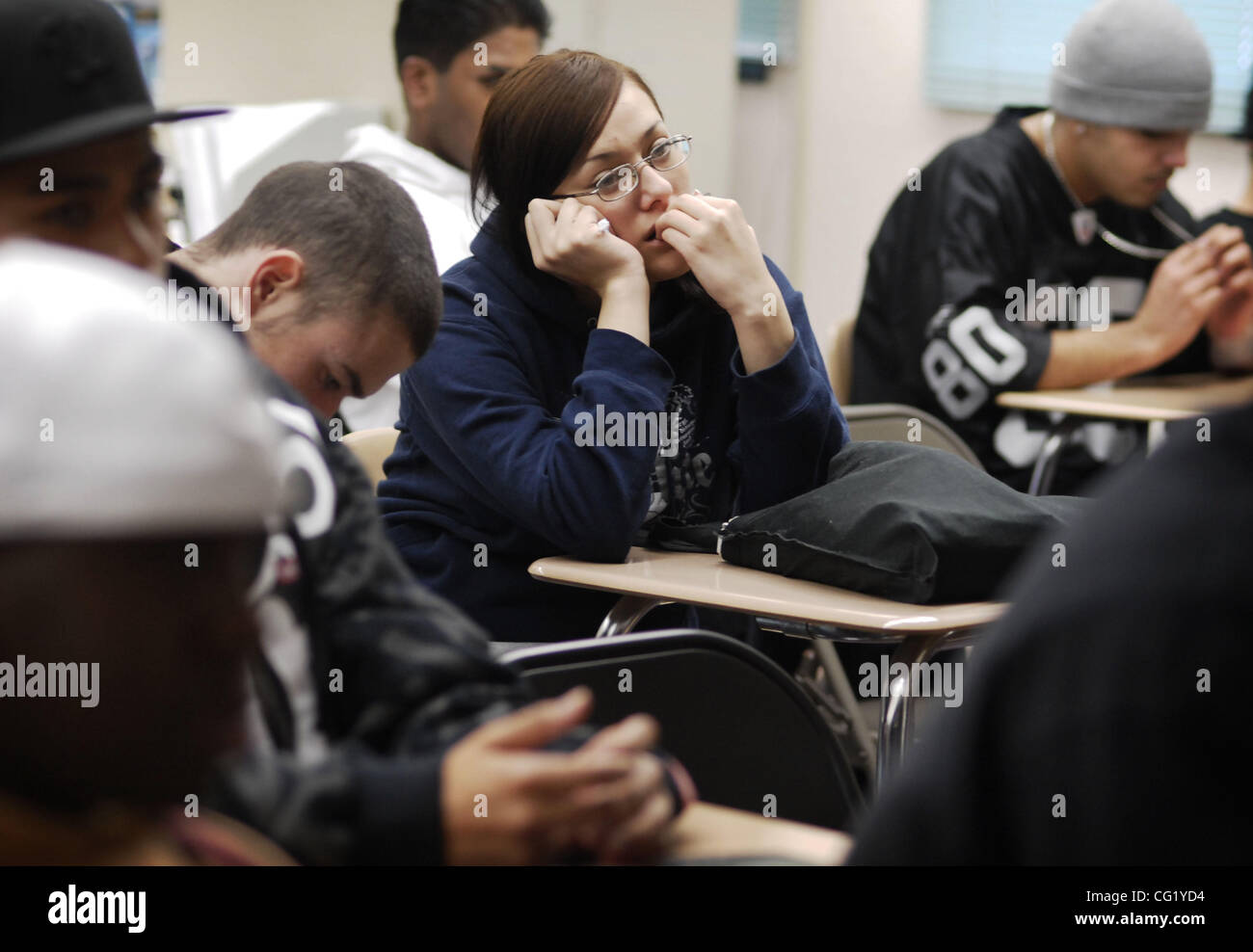 Students, including Sunnie DaRosa, 18,  listen to Elk Grove police officer Misty Daily talk about the dangers of street racing and reckless driving.   The presentation included a graphic video showing a teenage death and the viewing of the wreckage of a car accident that killed 17-year-old Nick Davi Stock Photo