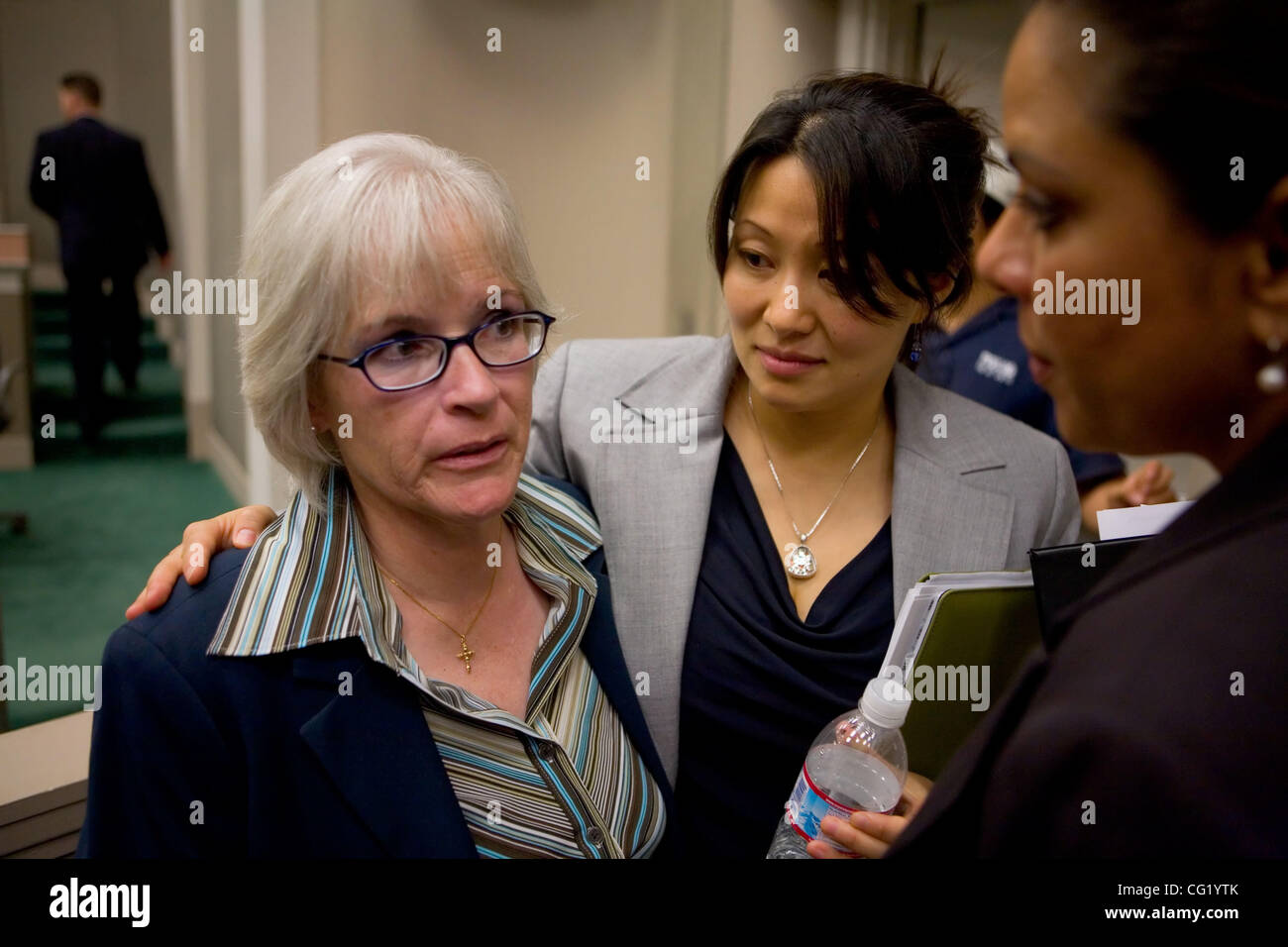 SECOND Supporters of the bill, Cancer Patient Patricia Carthew, of Los Angeles, and Dr. Jenny Biller, a OBGYN at UC Davis Med Center, talk with Assemblywoman Bonnie Garcia, following arguments on both sides of the issue argue AB 16 by Assemblyman Ed Hernandez, in the Assembly Health Committee the St Stock Photo