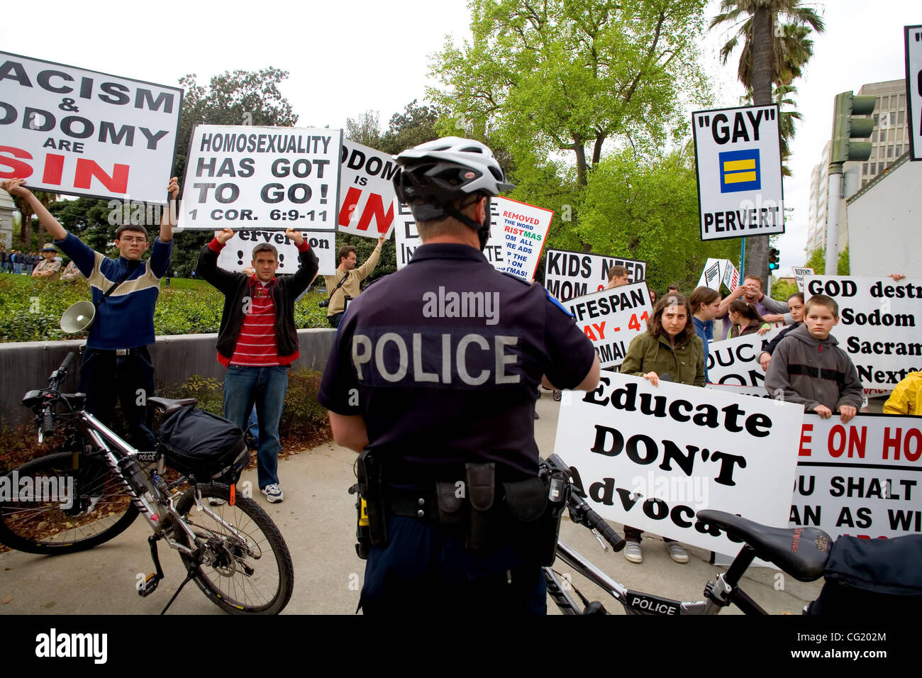 Police keep anti-gay protesters away from gay, straight and trans-gender high school students from around that state marching on the State Capitol to educate and lobby legislators, Monday March 26, 2007.  Sacramento Bee/  Brian Baer Stock Photo
