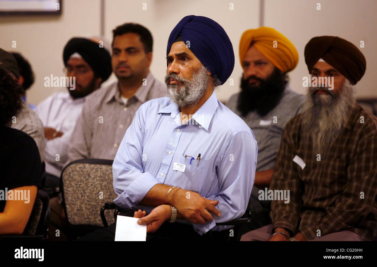 SECOND Members of the local Sikh community listen to public comment about their concerns over the photo of their leader being used in a textbook that they feel is offensive during the Department of Education Board meeting, Thursday July 12, 2007. Sacramento Bee/ Brian Baer Stock Photo
