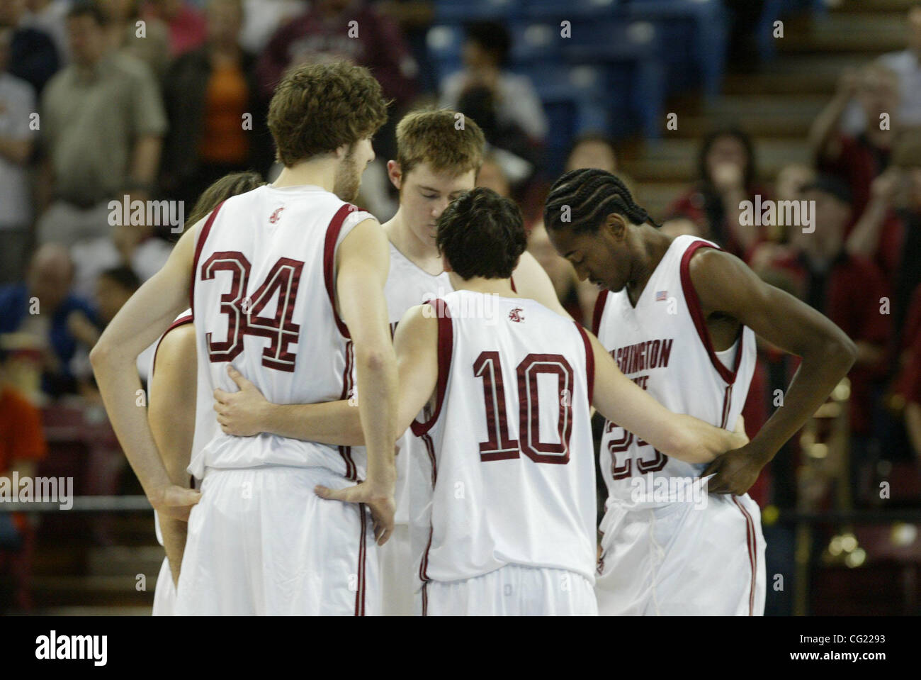(right)#10 Taylor Rochestie gathers his team together during a timeout ...