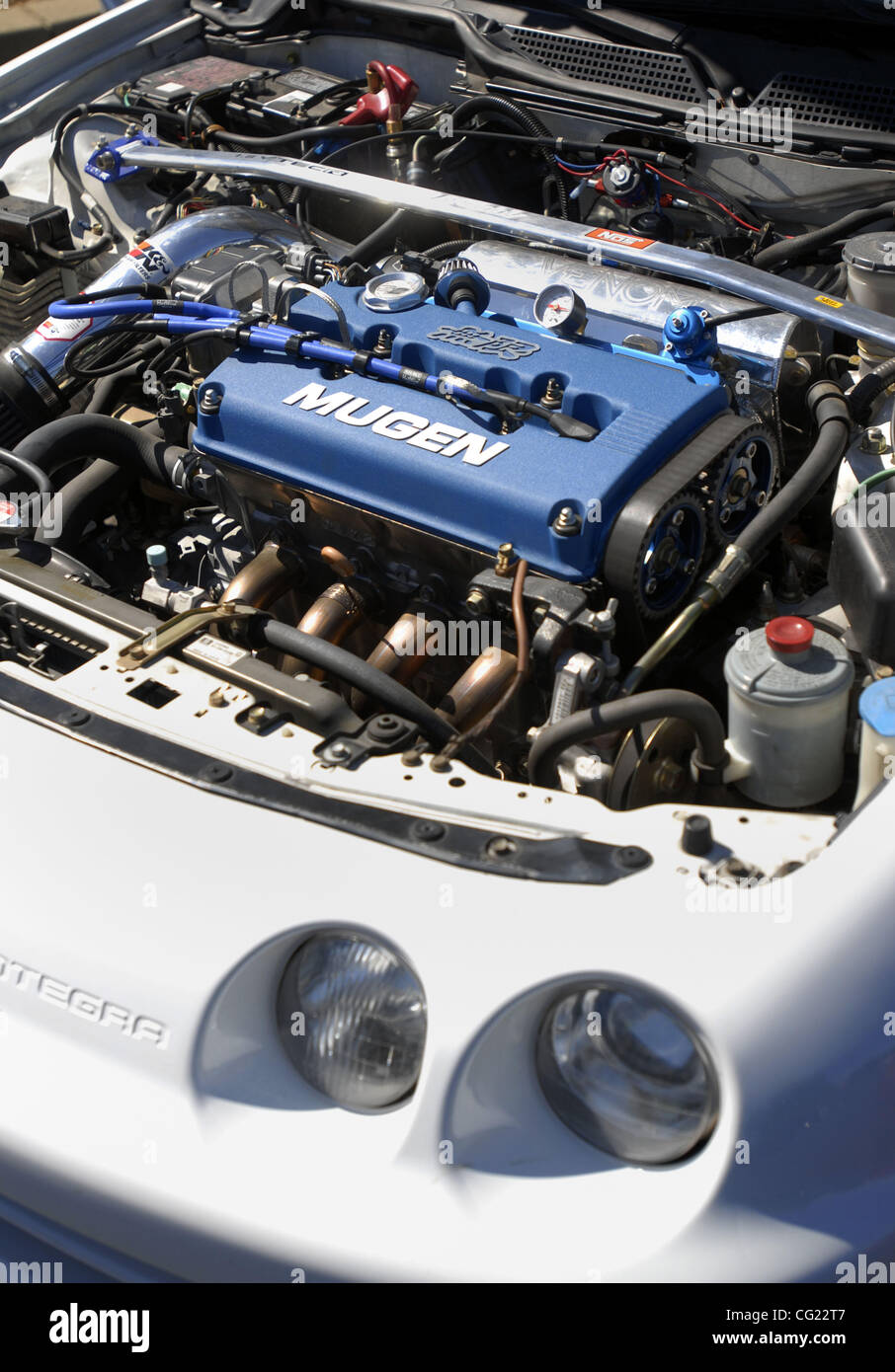 Illegally modified cars are displayed during a press conference in