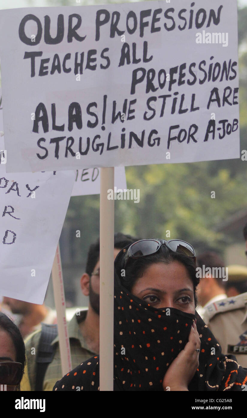 An kashmiri contractual lecturers during a protest rally in Srinagar, the summer capital of Indian Kashmir, 25 July 2011. Dozens of contractual lecturers staged a protest demanding their regularization. photo/Altaf Zargar/Zuma press Stock Photo