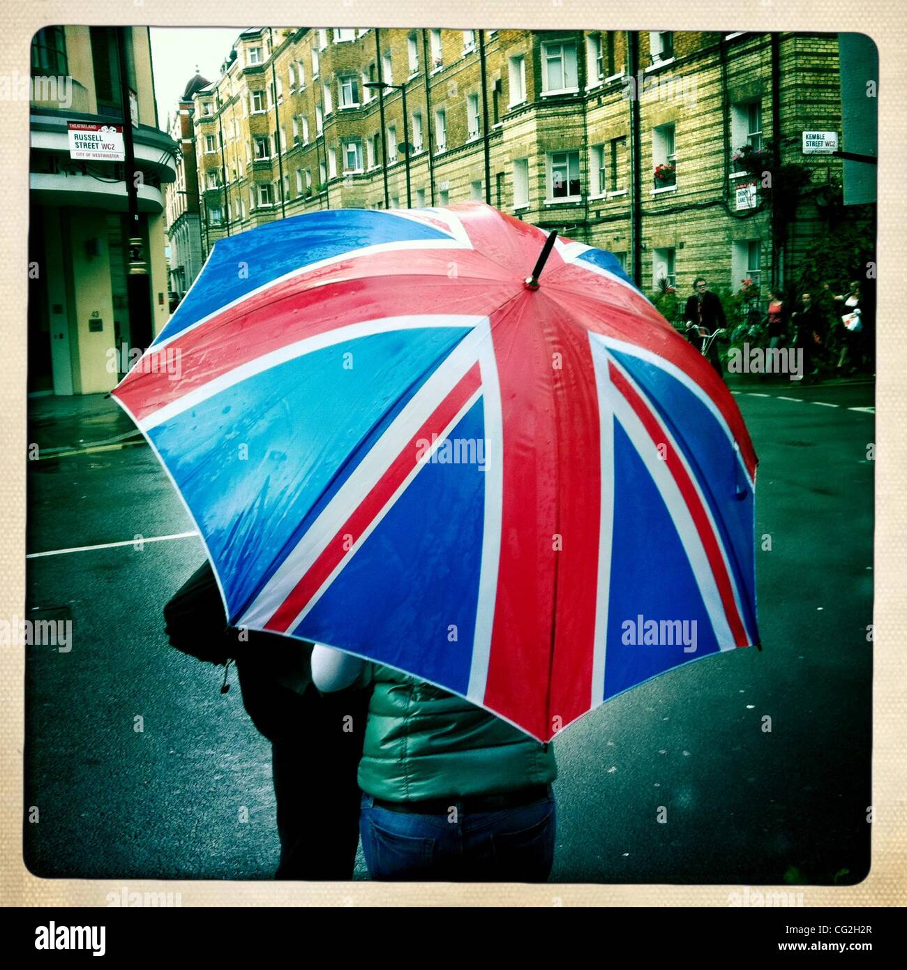 Umbrella with an English flag design, London, UK Stock Photo