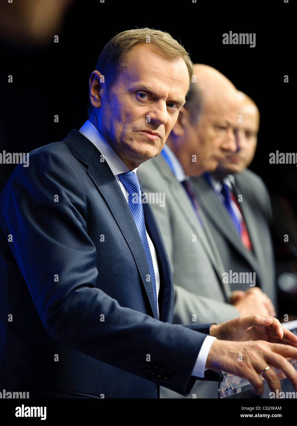 Oct. 26, 2011 - Brussels, BXL, Belgium - Polish Prime Minister Donald Tusk (L), Minister of finance Jacek Rostowski (C) and state secretary for EU relations Mikolaj Dowgielewicz hold the press conference after the meeting of the  European Council at the Justus Lipsius building, EU headquarters  in   Stock Photo