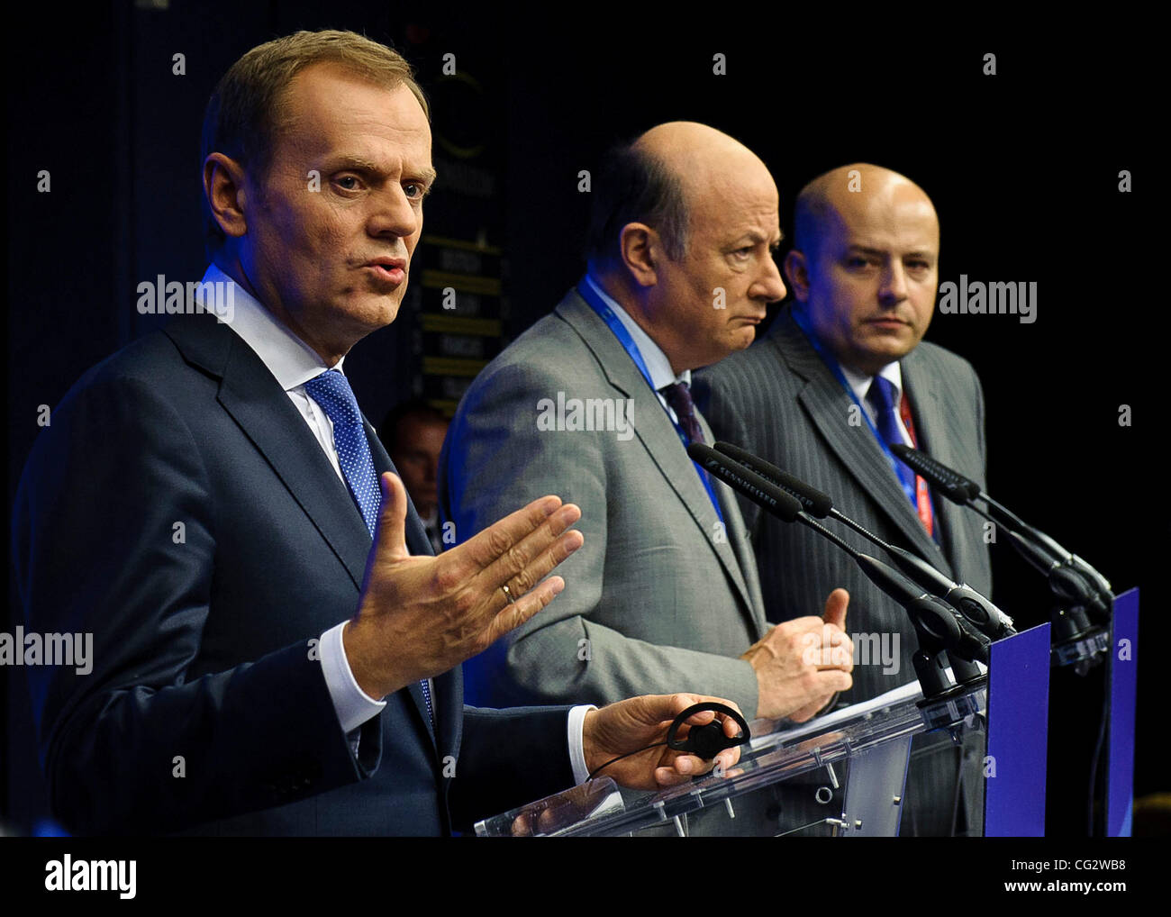 Oct. 26, 2011 - Brussels, BXL, Belgium - Polish Prime Minister Donald Tusk (L), Minister of finance Jacek Rostowski (C) and state secretary for EU relations Mikolaj Dowgielewicz hold the press conference after the meeting of the  European Council at the Justus Lipsius building, EU headquarters  in   Stock Photo