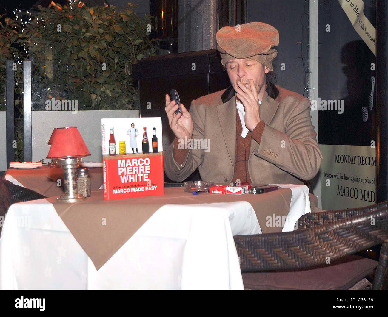 Chef Marco Pierre White takes a break and smokes a cigarette outside his  restaurant Dublin, Ireland - 13.12.10 Stock Photo