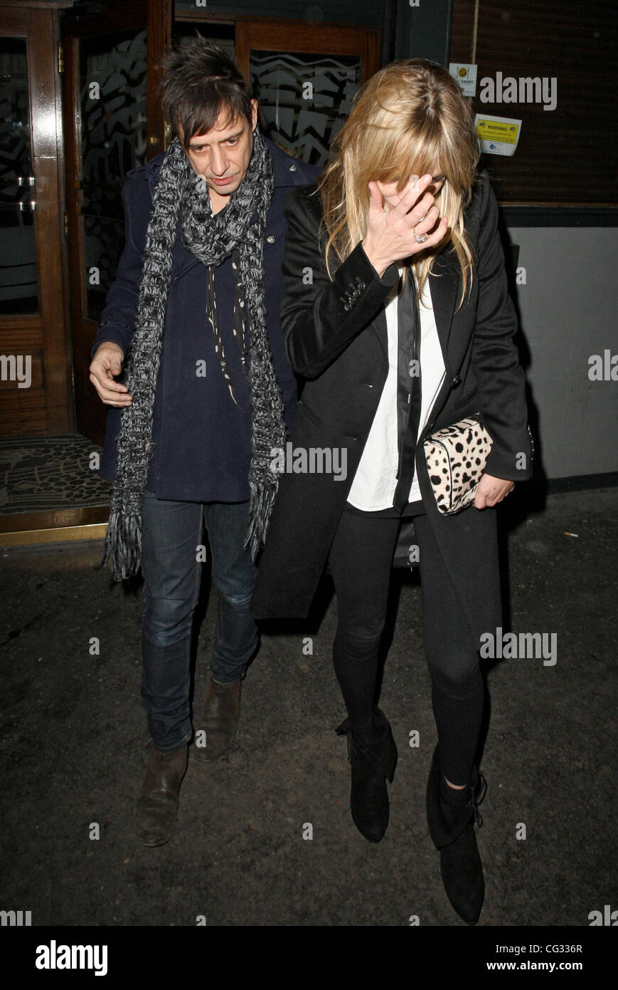 Kate Moss and Jamie Hince leaving Groucho Club at 3am, Kate arrived at 9.45pm and met Jamie inside. London, England - 14.12.10 Stock Photo