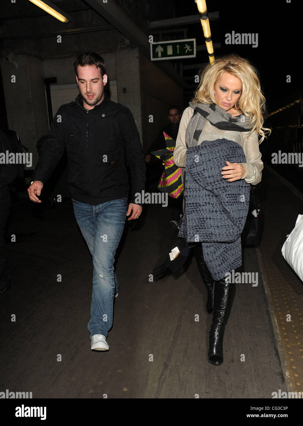 Pamela Anderson arrives at Euston station, following an incident at