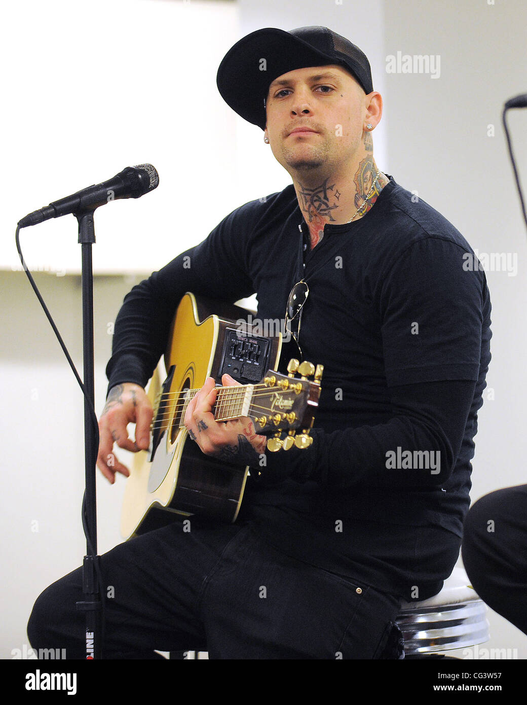 Benji Madden Good Charlotte performing an acoustic concert at Macys Aventura, Florida 15.01.11