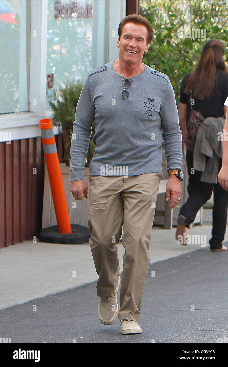 Arnold Schwarzenegger and family leave a restaurant in Brentwood after having lunch. Los Angeles, California - 16.01.11 Stock Photo