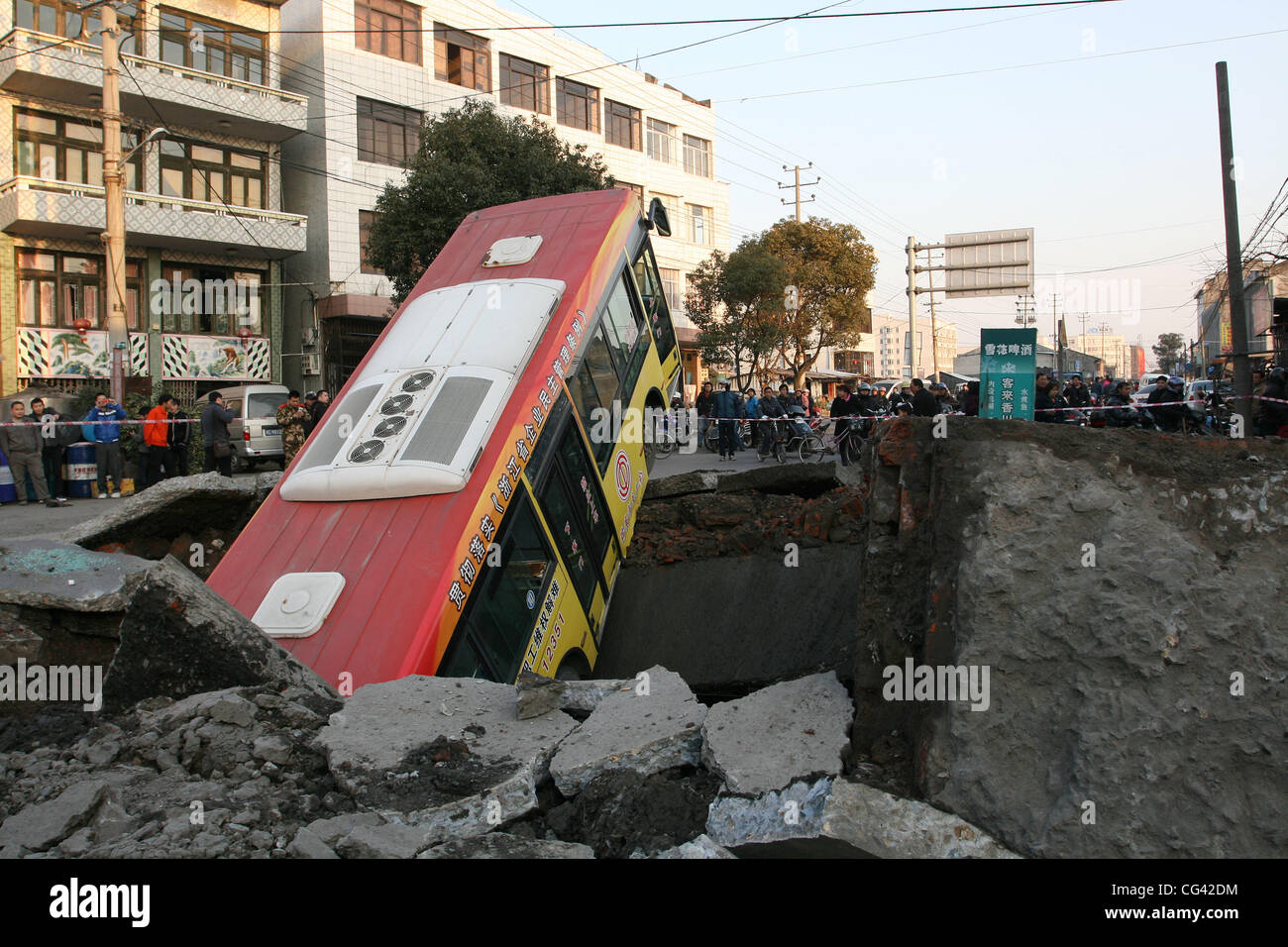 Residents of the Chinese city of RuiAn were left stunned when a bus suddenly flew four metres into the air, causing chaos on the streets. It's believed the vehicle was caught up in a marsh gas explosion, which occurred deep underground. Nobody was injured Stock Photo