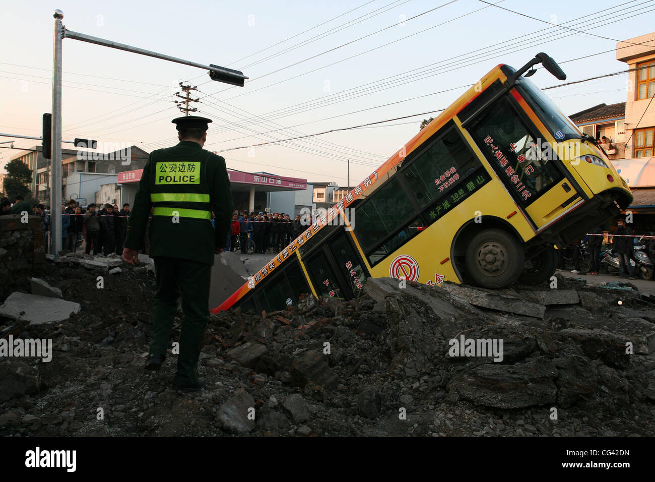 Residents of the Chinese city of RuiAn were left stunned when a bus suddenly flew four metres into the air, causing chaos on the streets. It's believed the vehicle was caught up in a marsh gas explosion, which occurred deep underground. Nobody was injured Stock Photo