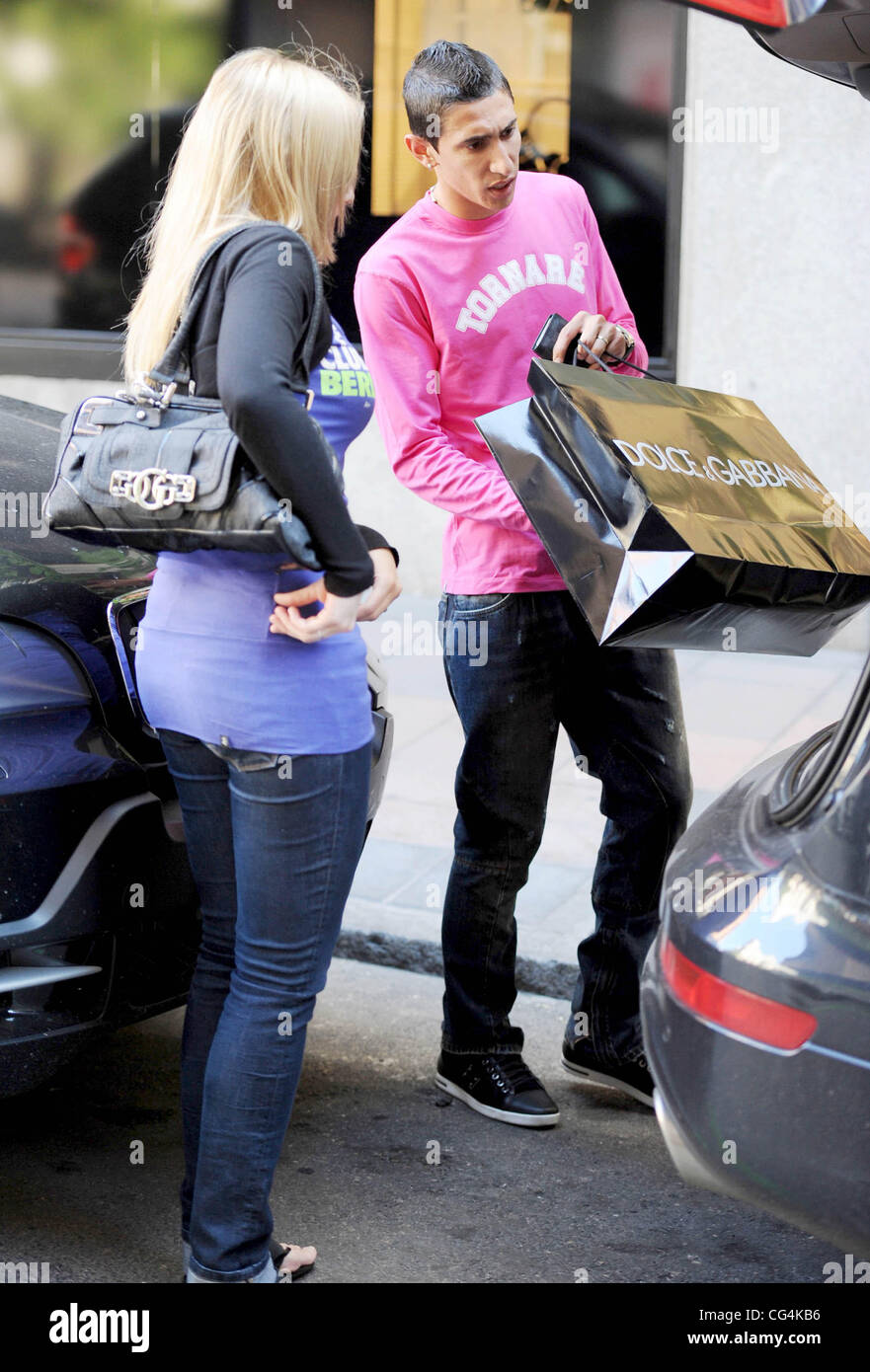 Angel Di Maria Real Madrid C.F. football player leaving a Dolce & Gabbana  store after shopping with his girlfriend Madrid, Spain - 29.09.10 Stock  Photo - Alamy