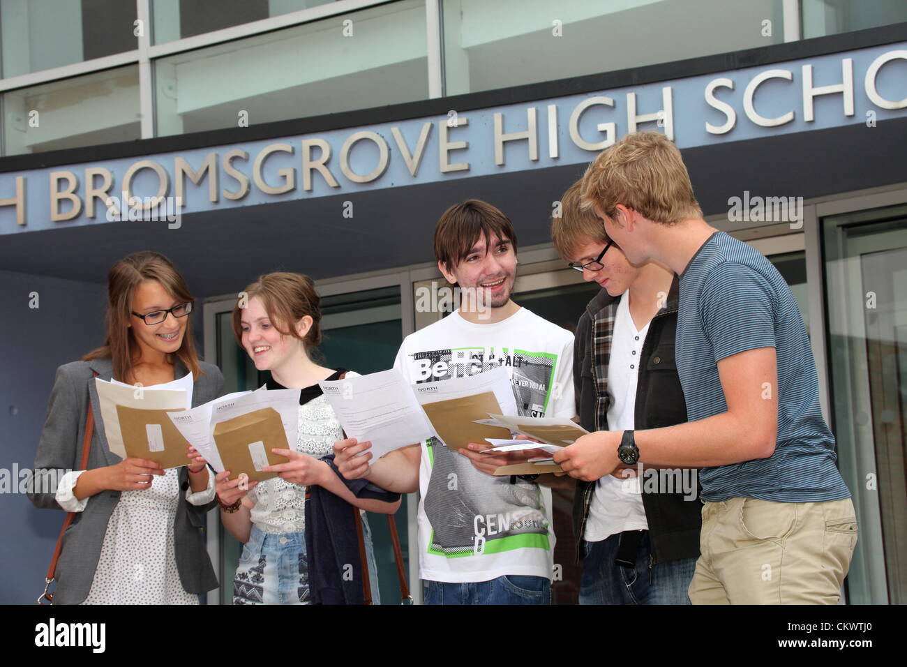 Students at a UK comprehensive school receive their exam results, August 2012 Stock Photo