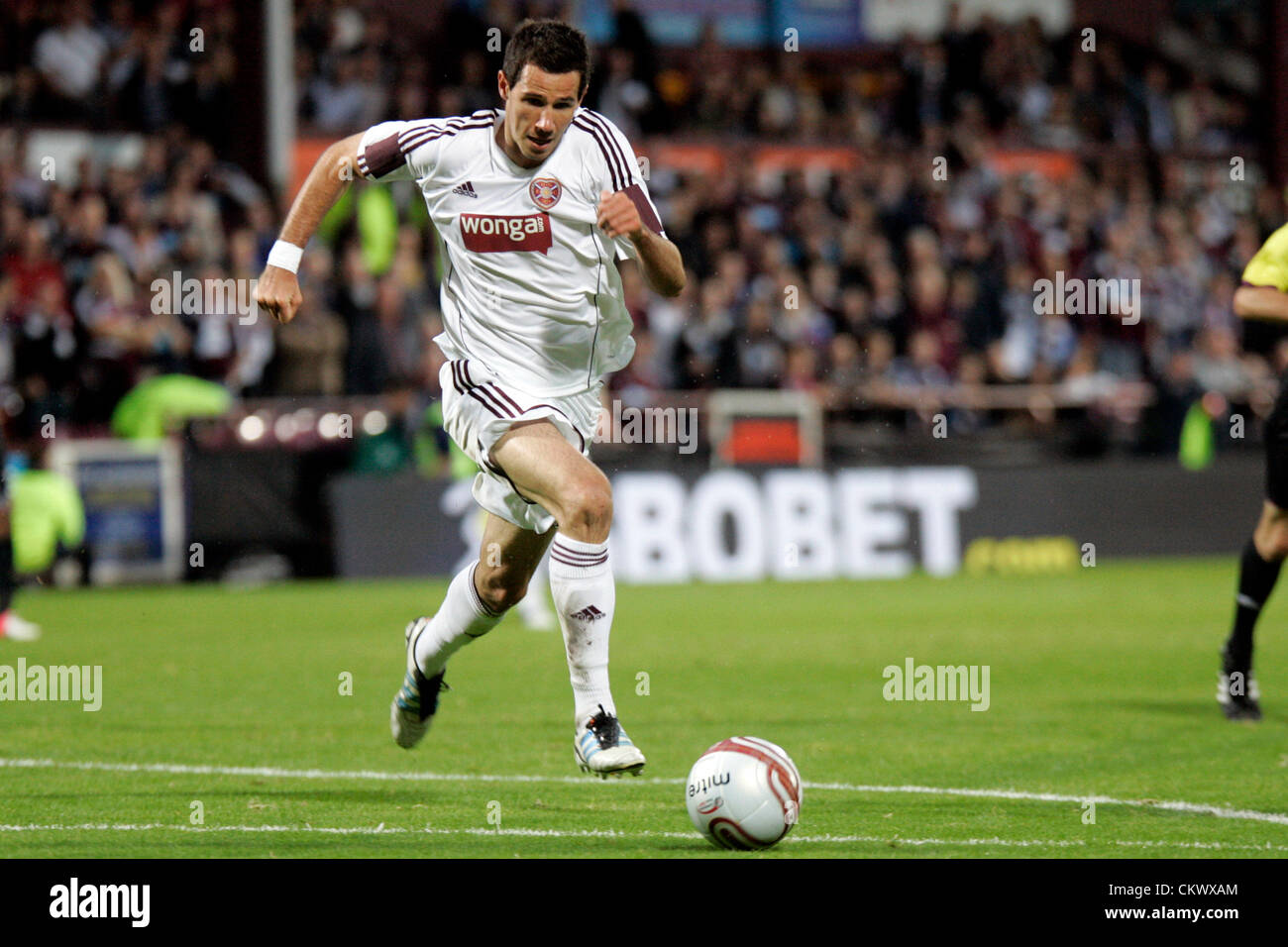 23.08.2012 Edinburgh, Scotland. 4 Ryan McGowan in action during the Europa League Qualifying 1st leg tie between Hearts and Liverpool from the Tynecastle Stadium. Hearts lost 0-1 to an own goal in the first leg. Stock Photo