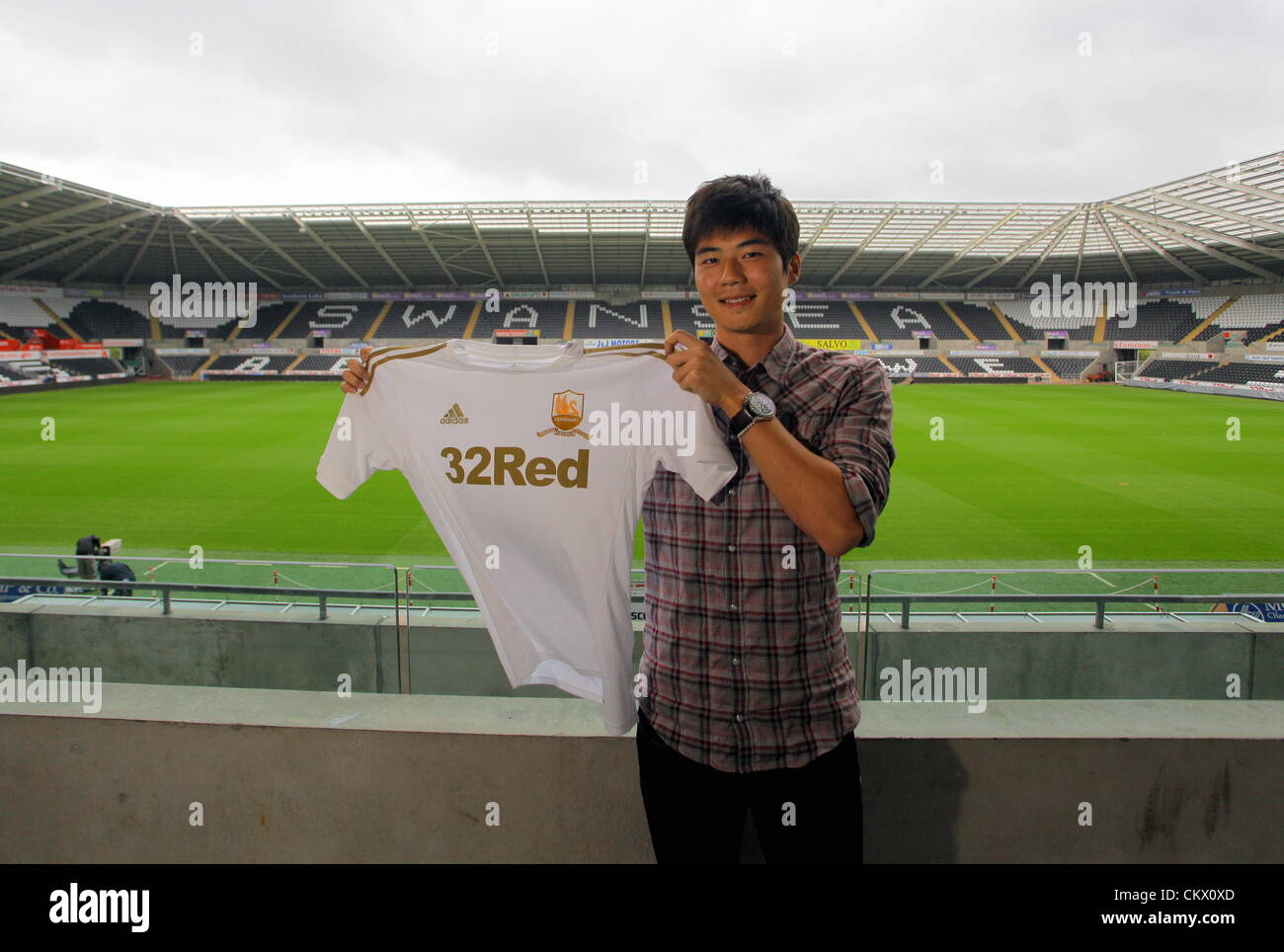 Pictured: New Swansea signing, Ki Sung-Yueng at the Liberty Stadium, south Wales. Friday 24 August 2012  Re: Midfielder Ki Sung-Yeung has completed his almost £6million move to Swansea City FC from Celtic. Stock Photo