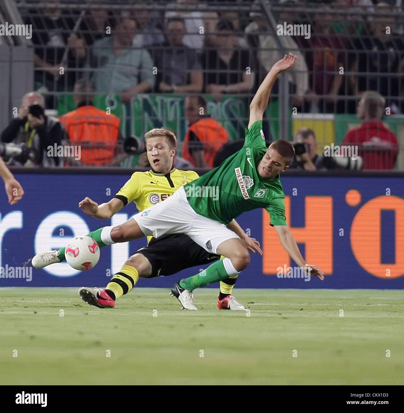 24.08.2012. Dortmund, Germany.  Borussia Dortmund versus SV  Werder Bremen. Jakub Blaszczykowski Borussia Dortmund and Sokratis Werder Bremen Stock Photo