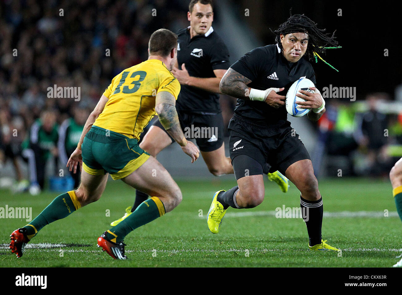 Saturday 25 August 2012. Auckland, New Zealand.  All Blacks' Ma'a Nonu runs at Australia's Rob Horne during the Rugby Championship and Bledisloe Cup Rugby Union test match, New Zealand All Blacks versus Australian Wallabies at Eden Park, Auckland, New Zealand.  Stock Photo