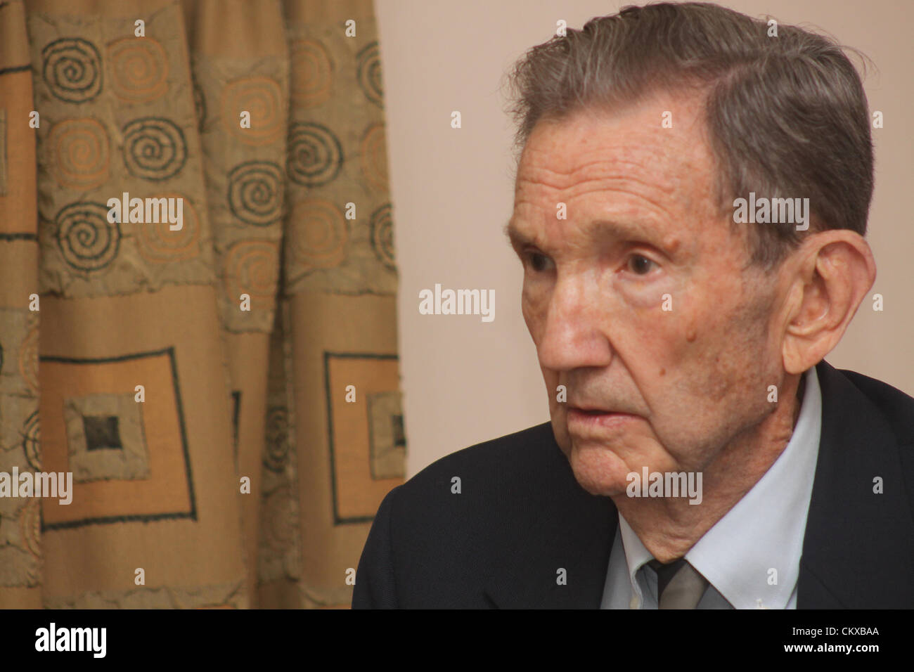Former American Attorney General Ramsey Clark gestures during meet the