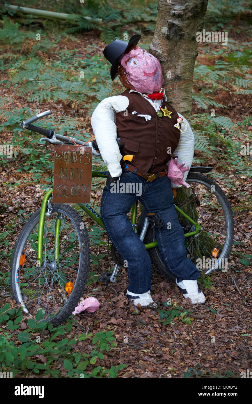 27 August 2012. Bisterne, New Forest National Park, Hampshire, UK. Bisterne Scarecrow Festival 2012. Woody Toy Story. Credit:  Carolyn Jenkins / Alamy Live News Stock Photo