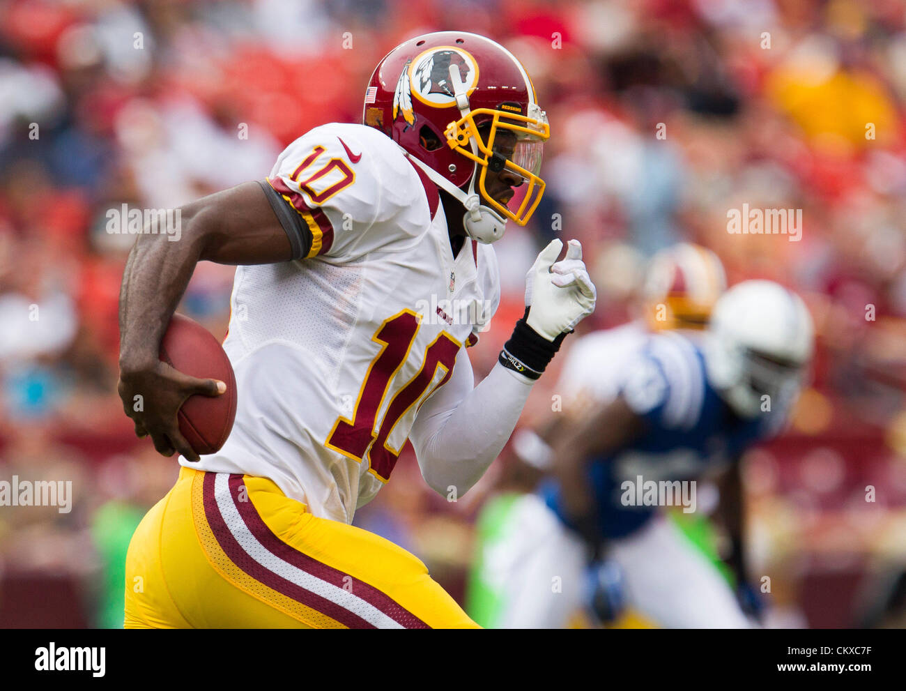 Redskins QB Robert Griffin III (10) in action during the Indianapolis Colts vs. Washington Redskins preseason NFL football game.  The Redskins defeat the Colts 30 - 17. Stock Photo