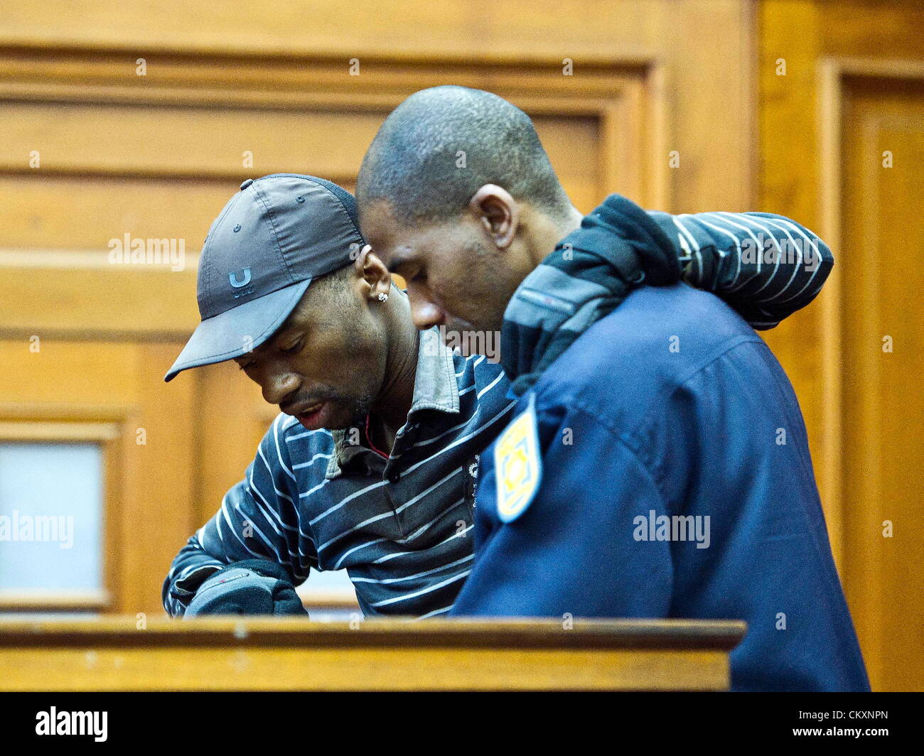 Cape Town, South Africa. 30th Aug 2012. Xolile Mngeni appears in the Cape Town High Court, on August 30, 2012 in Cape Town, South Africa. He is accused of being involved in the murder on Anni Dewani, whose British husband Shrien Dewani allegedly plotted her murder while on honeymoon in South Africa. (Photo by Gallo Images / Foto24 / Yunus Mohamed/ Alamy Live News) Stock Photo