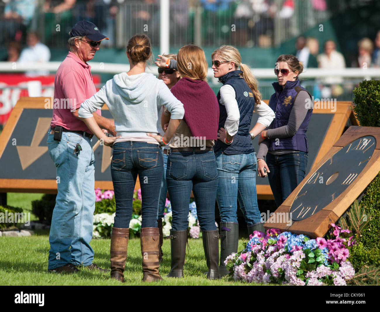 Burghley House, Stamford, UK - Mark Phillips and girlfriend Lauren Hough walk the cross country course at Burghley Horse Trials with other US riders, 31st August 2012. Stock Photo