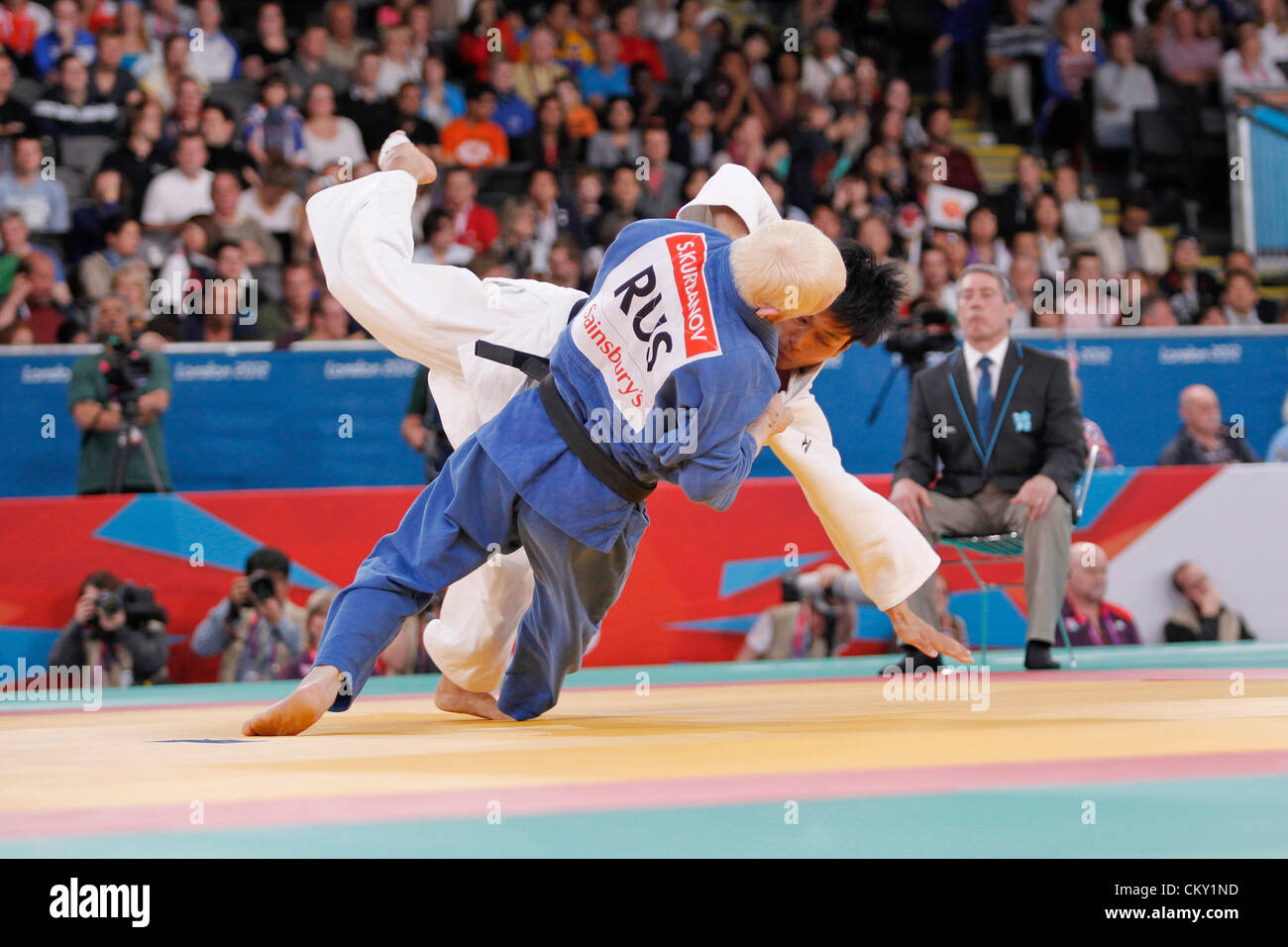 31.08.2012. London, England, 2012 Paralympic Games.   judo  bronze medal action. u73 kilo Shakban Kurbanov (RUS) blue throws Hidekatsu (JPN) for ippon to win bronze medal. Stock Photo
