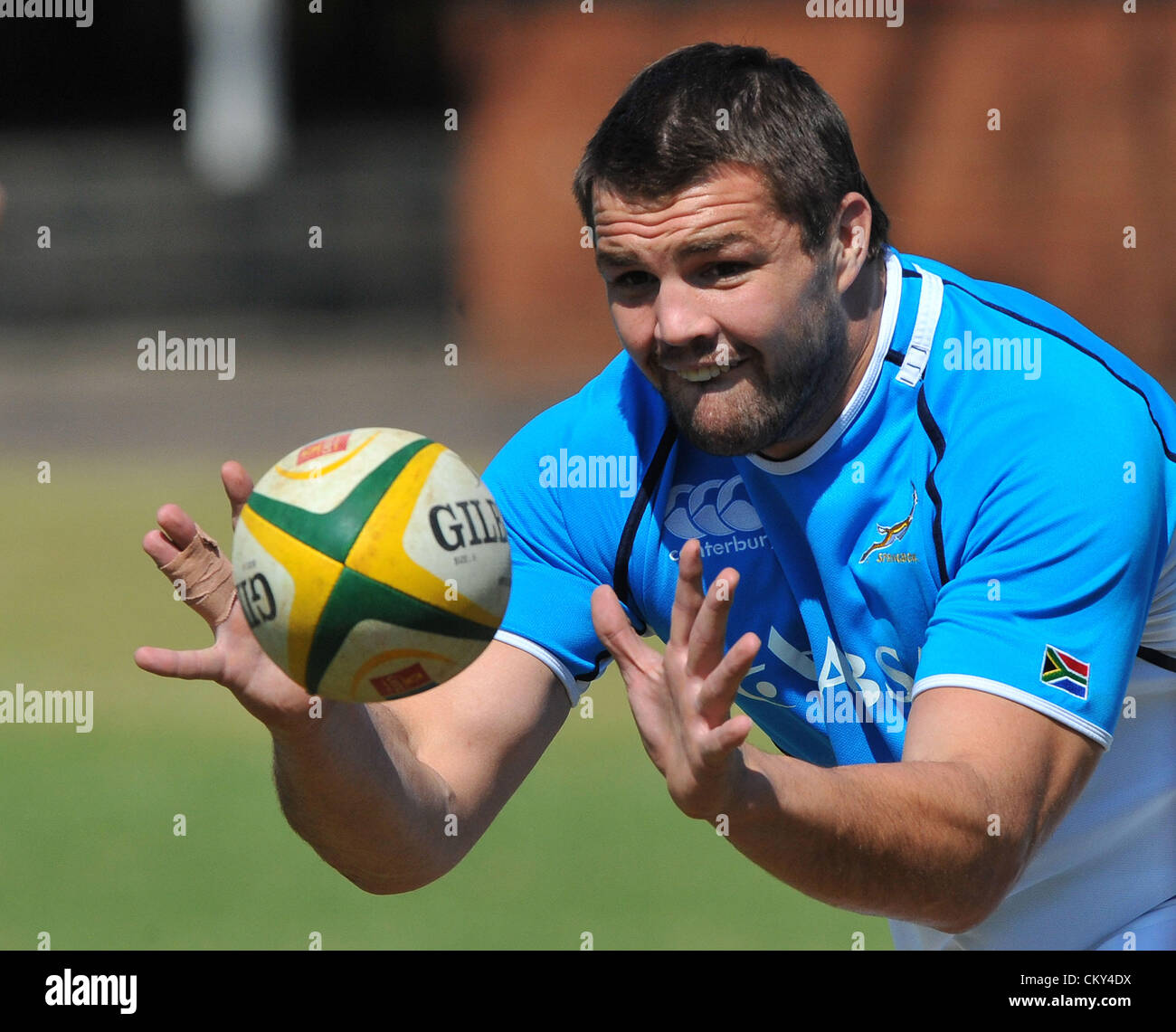 JOHANNESBURG, SOUTH AFRICA - SEPTEMBER 01, Flip van der Merwe receives the ball during the South African national rugby team field session and media conference at KES on September 01, 2012 in Johannesburg, South Africa Photo by Duif du Toit / Gallo Images Stock Photo