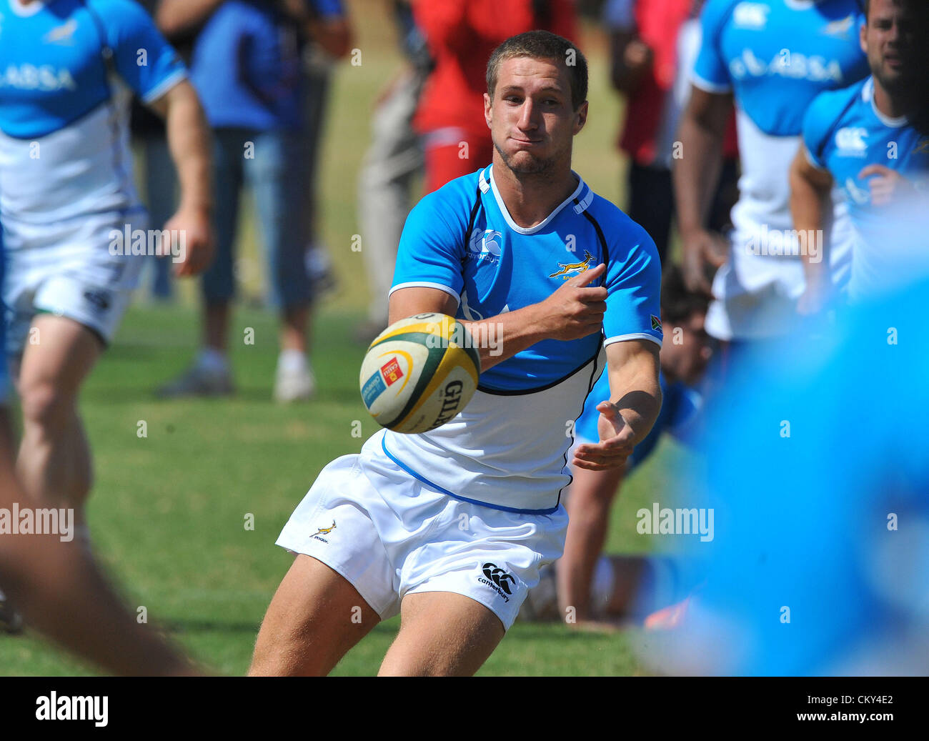 JOHANNESBURG, SOUTH AFRICA - SEPTEMBER 01, Johan Goosen soreads the ball during the South African national rugby team field session and media conference at KES on September 01, 2012 in Johannesburg, South Africa Photo by Duif du Toit / Gallo Images Stock Photo
