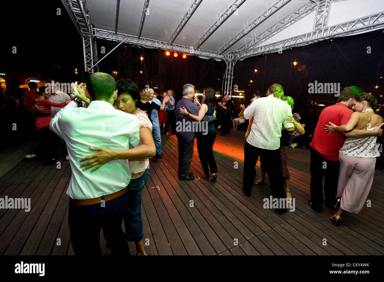 August 31st, 2012, Warsaw, Poland. Regular Friday gathering of tango buffs in the open air at the main promenade street of the capital city. Stock Photo