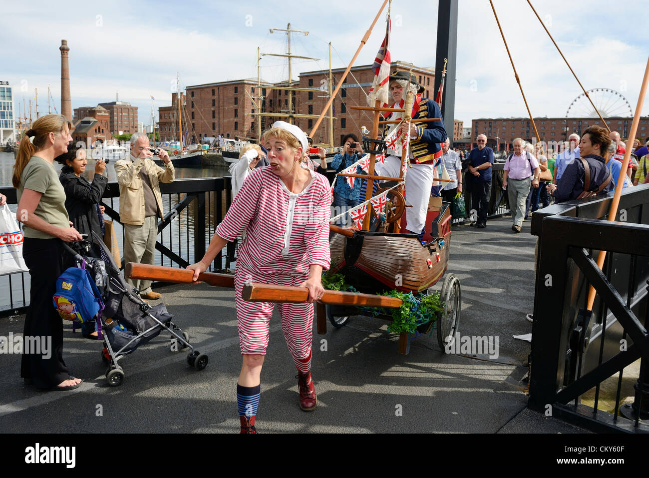 Saturday 1st September 2012. Liverpool, UK. The Irish Sea 2012 Tall Ships Regatta. Street entertainment at The Albert Dock, Liverpool. Stock Photo